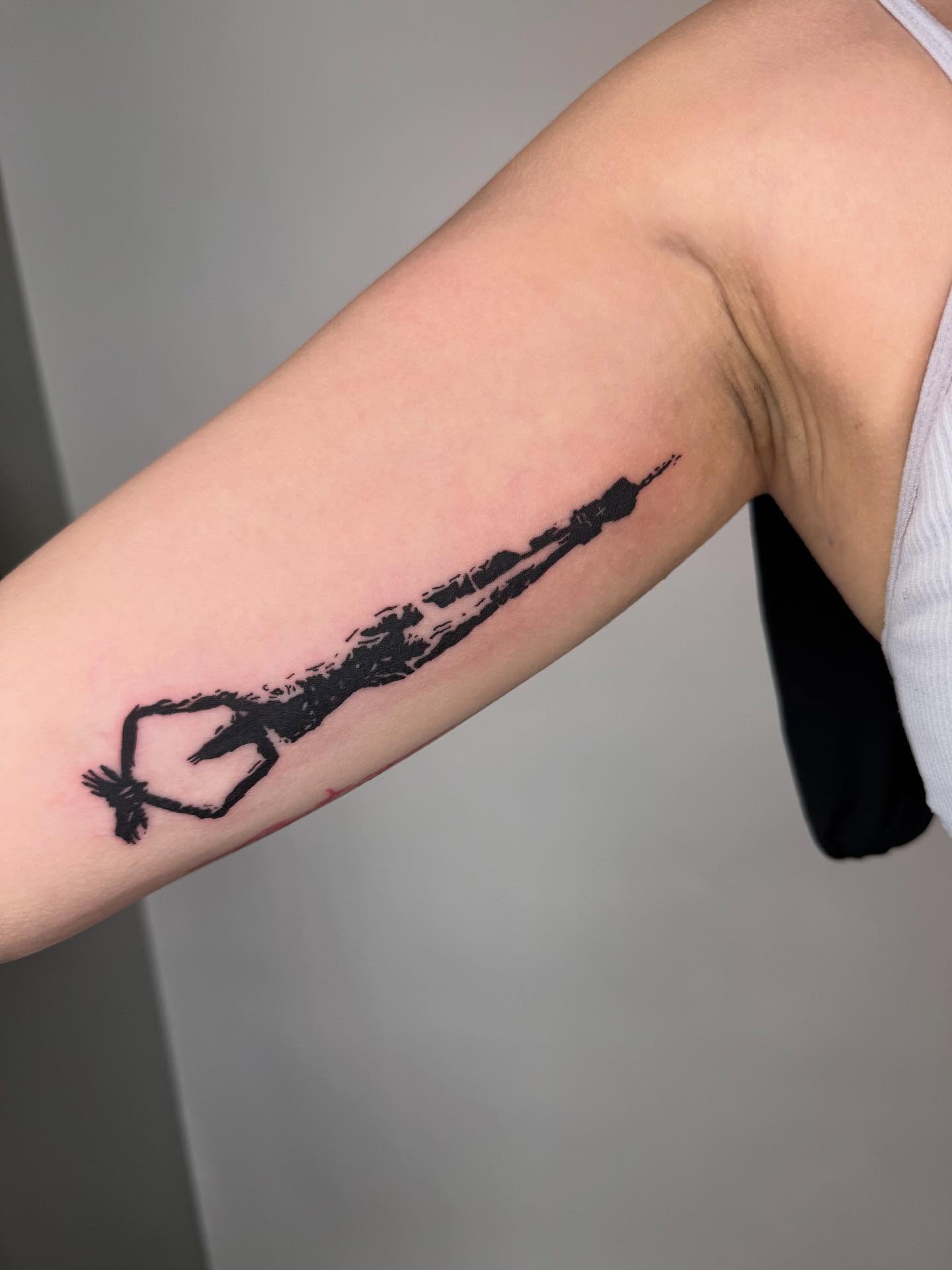 Rocket black and grey tattoo on the forearm by Joey tattoo