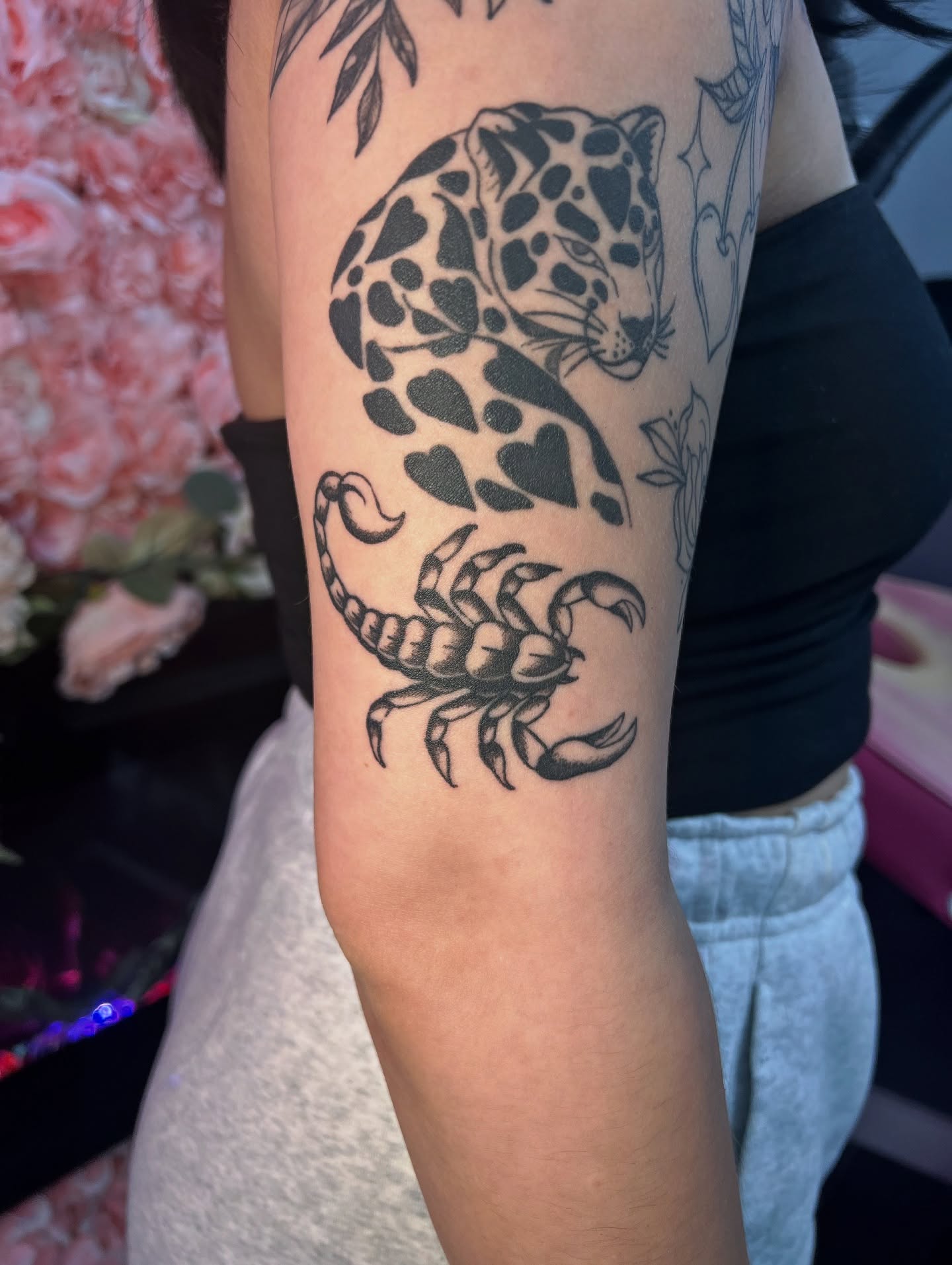 Jaguar and scorpion black and grey tattoo on the forearm by 𝒱𝒽𝓎𝓍𝒾𝓃