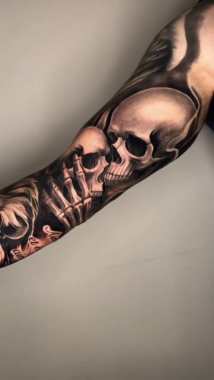 Skulls and bones realism tattoo by David "Mager" Torres