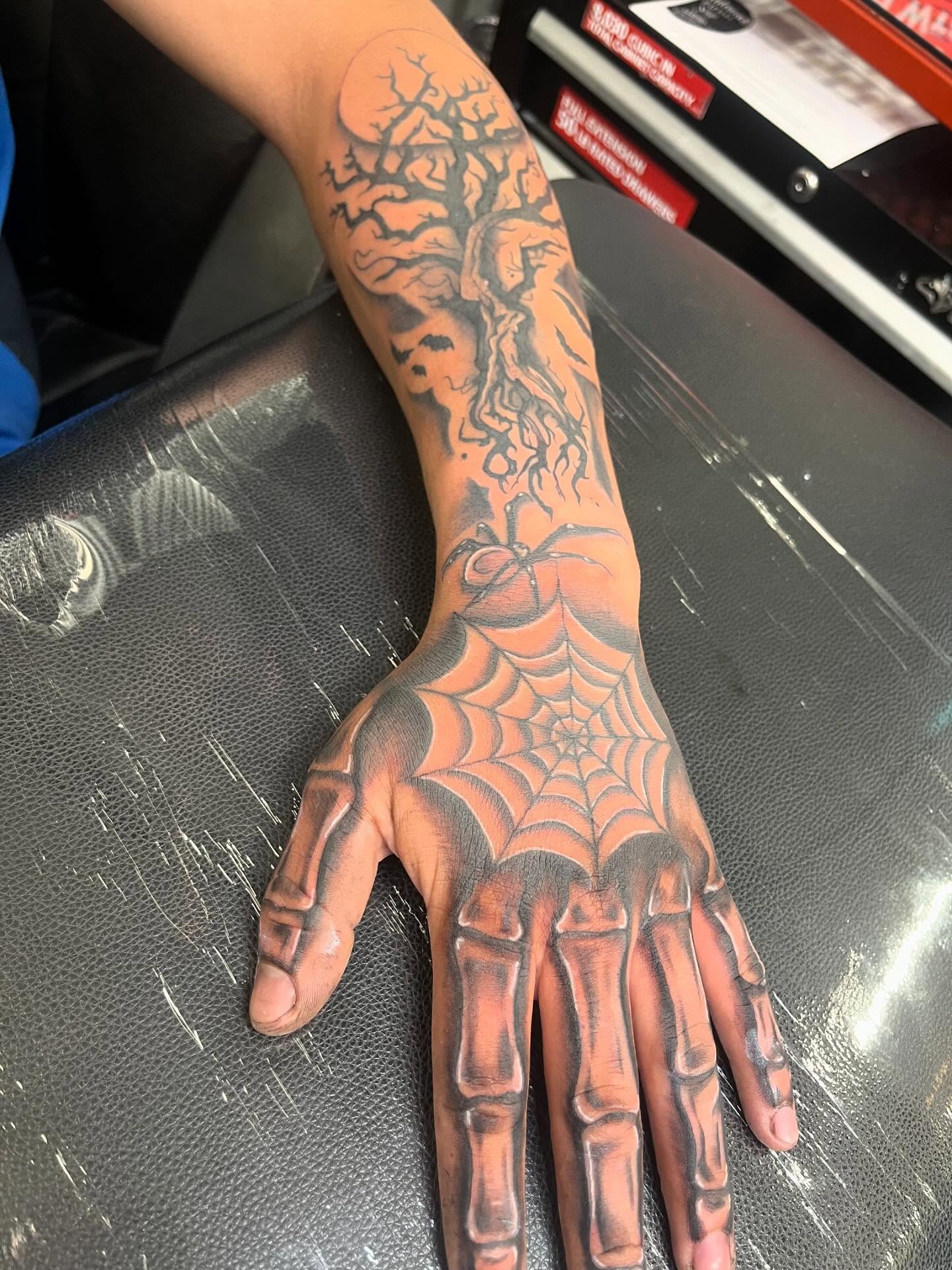 Spiderweb skeleton hand realism tattoo on the hand by Ink by Hailey π
