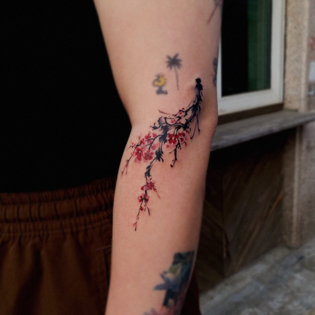 Tattoo by @dyun_tat2 — watercolor