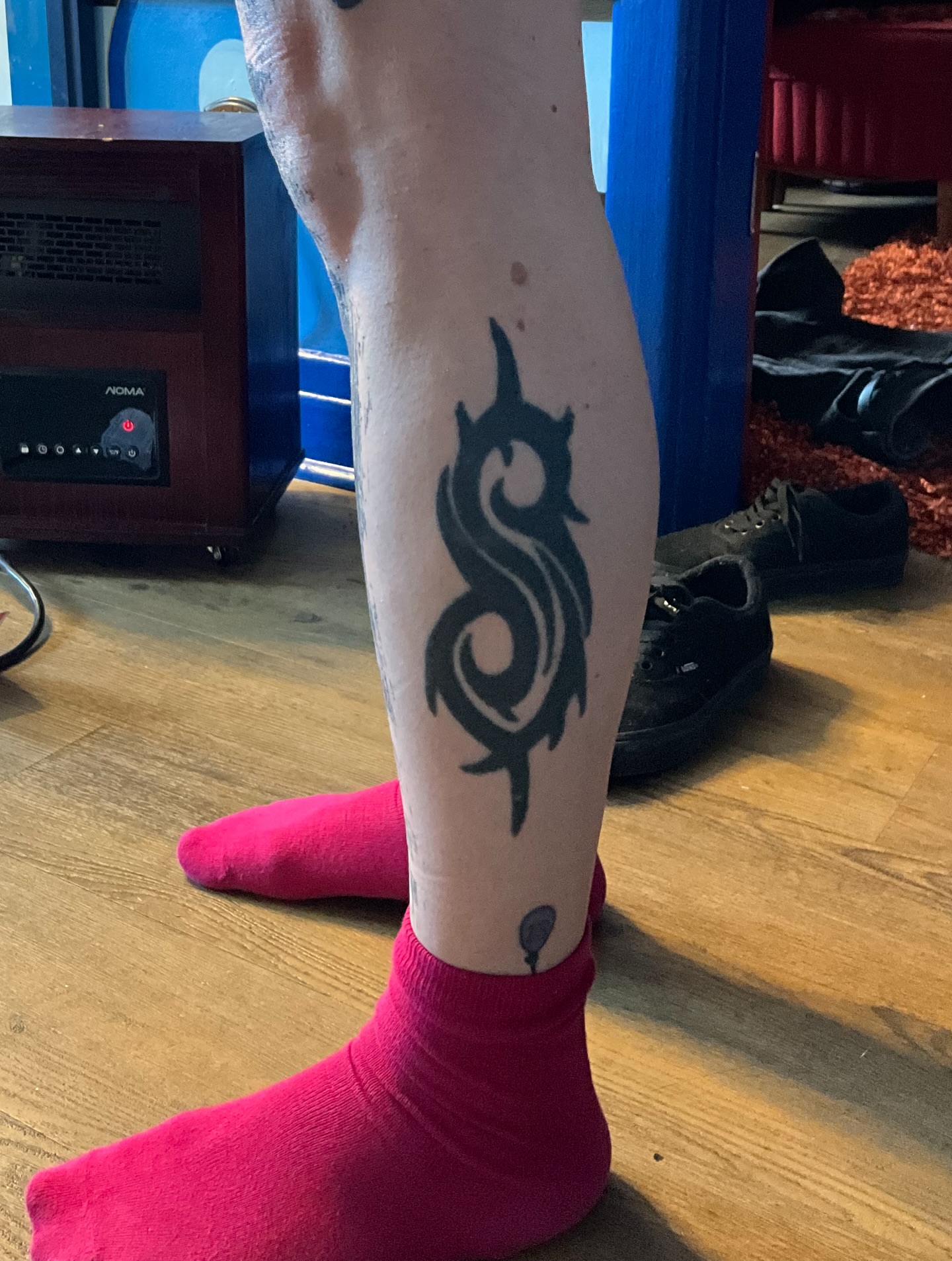 Slipknot logo tribal tattoo on the calf by Bombay Pain Co.