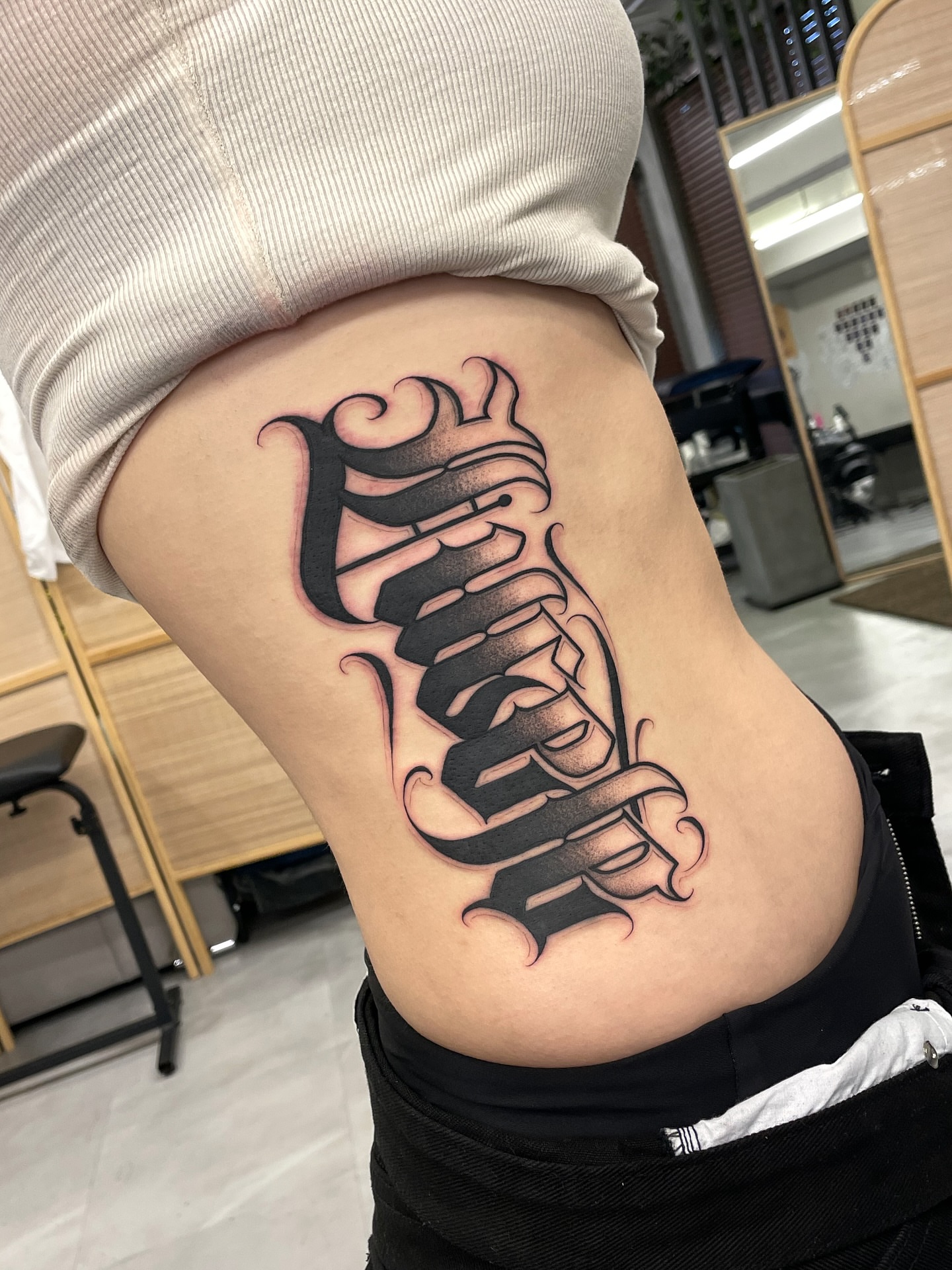 Script lettering lettering script tattoo on the thigh by Joon 치카노레터링