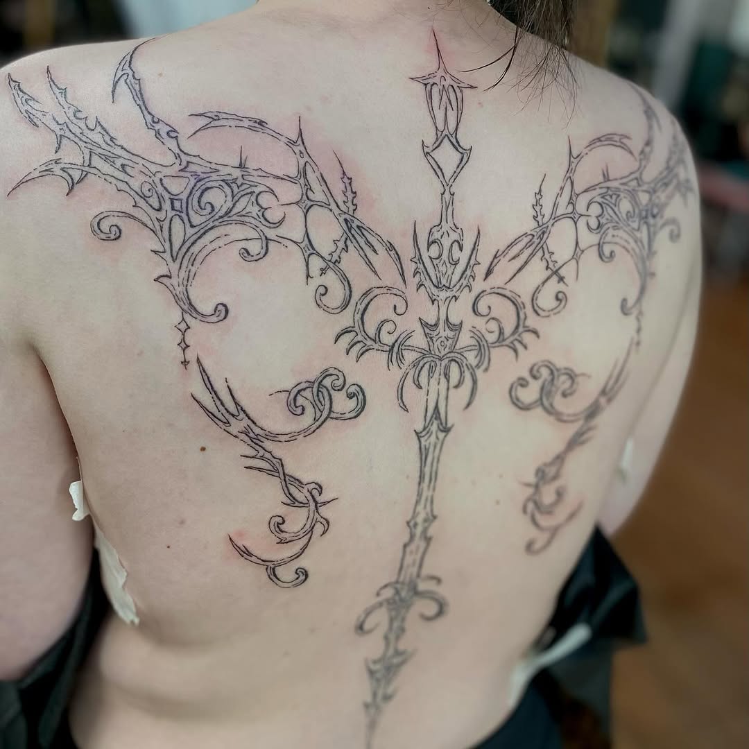 Tattoo by @madtatclub — blackwork, ornamental