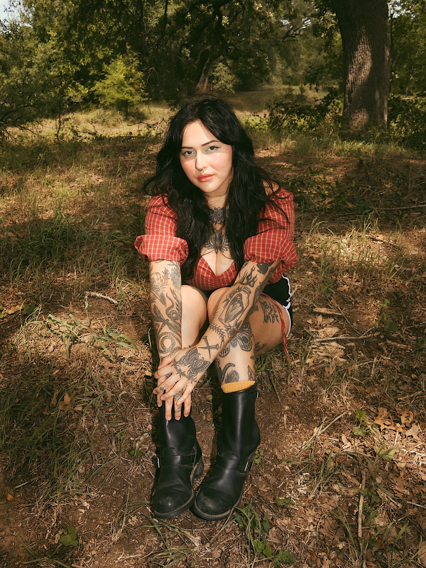 Tattooed arms American traditional tattoo on the upper arm by Myka King