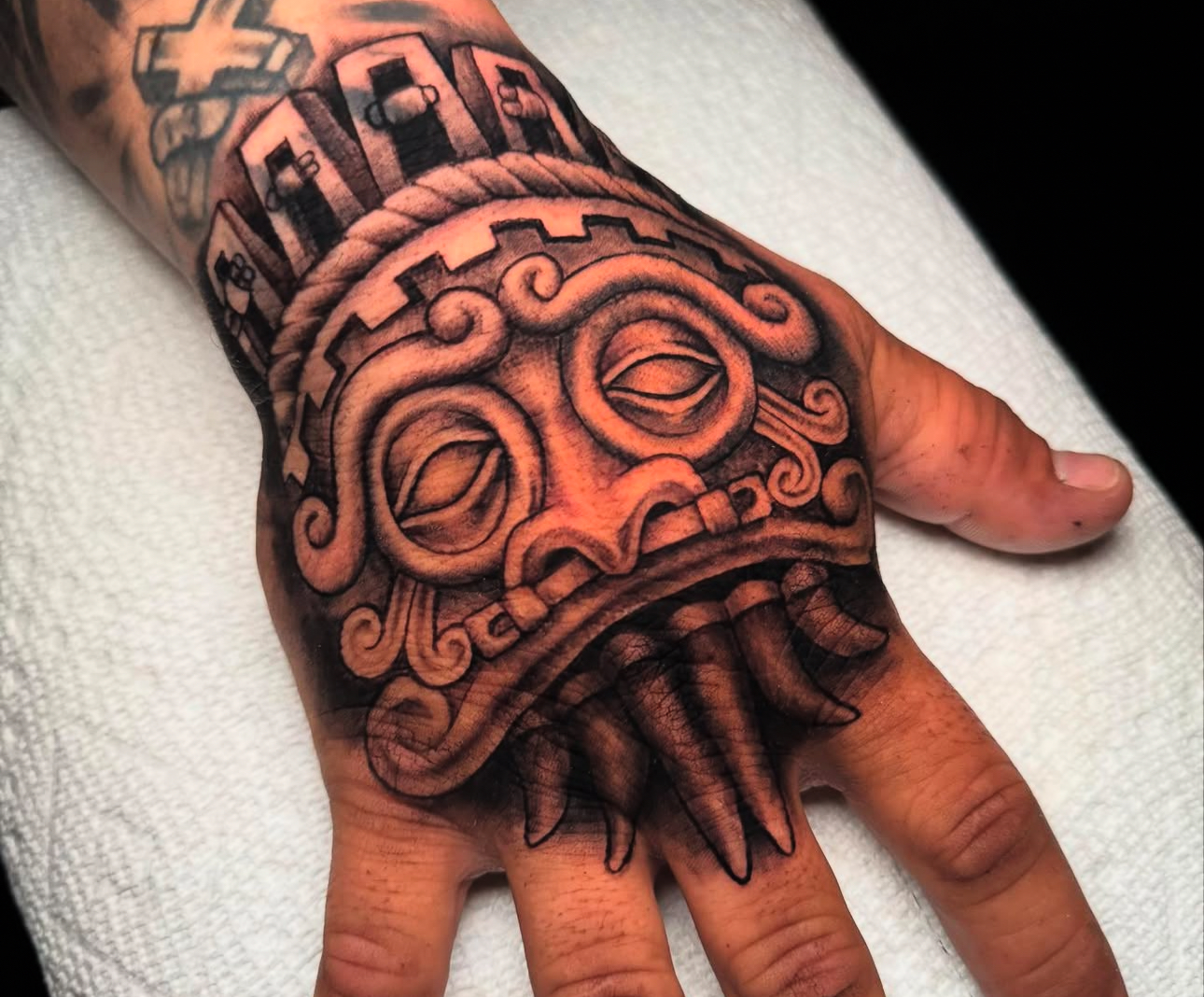 Mask black and grey tattoo on the hand by 𝕾𝖈𝖗𝖎𝖕𝖙 𝕾𝖕𝖊𝖈𝖎𝖆𝖑𝖎𝖘𝖙