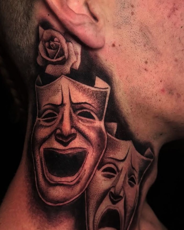 Theater masks black and grey tattoo on the neck by 𝕾𝖈𝖗𝖎𝖕𝖙 𝕾𝖕𝖊𝖈𝖎𝖆𝖑𝖎𝖘𝖙