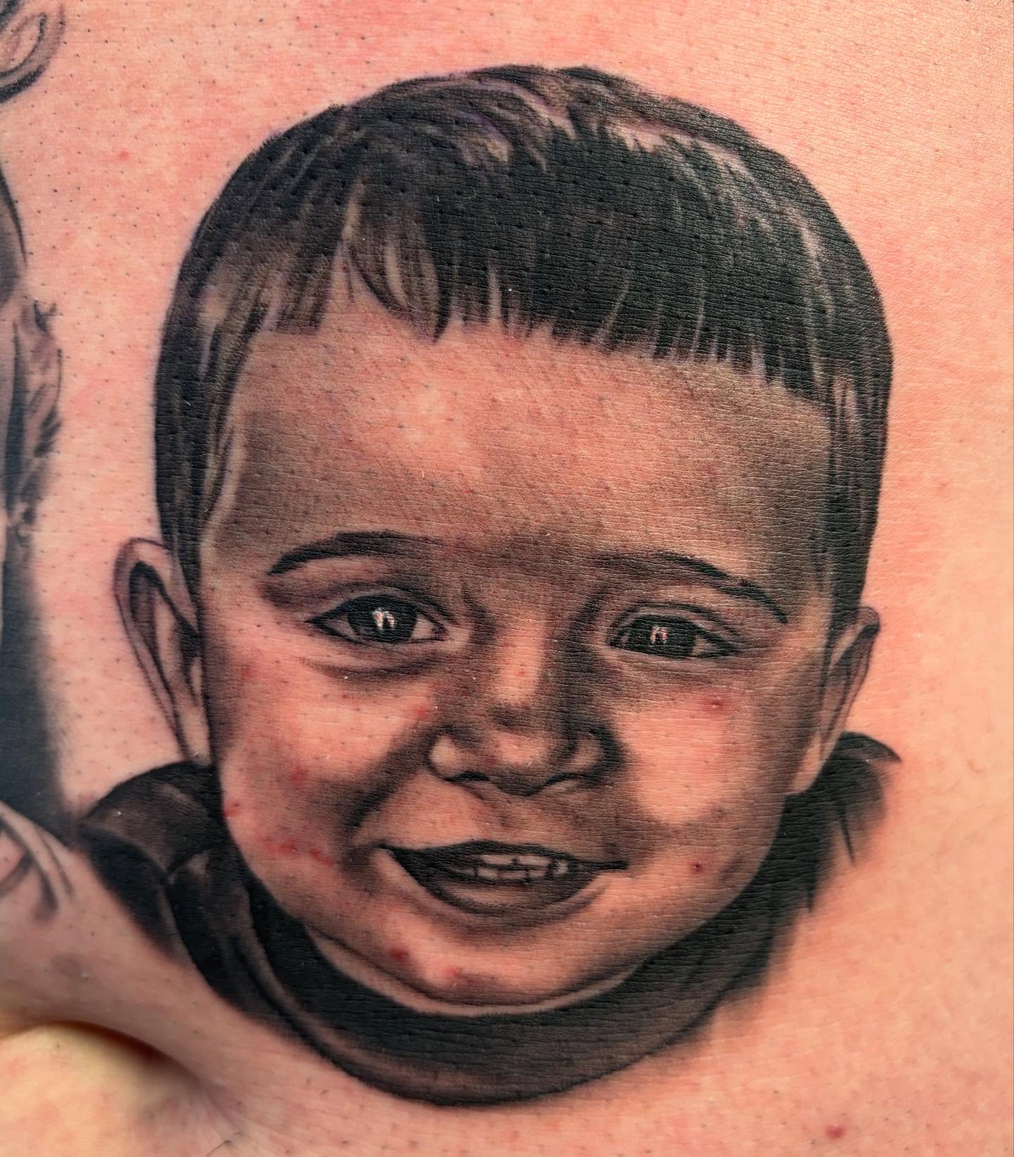 Child's face realism tattoo on the back by Mike Doherty, Abington, Massachusetts