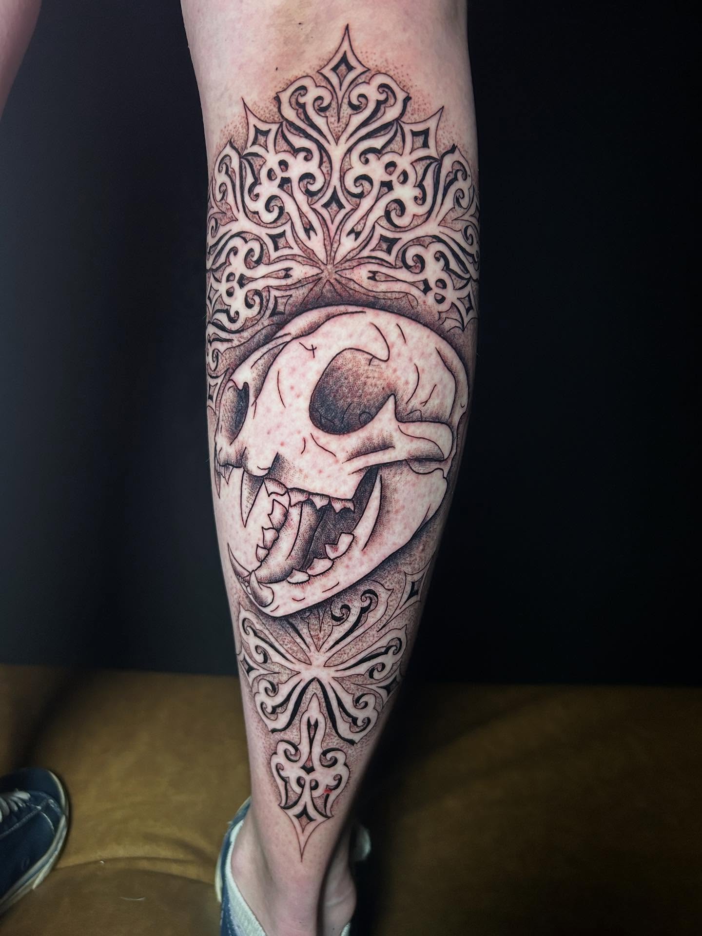 Skull realism tattoo on the calf by Katarina Gorchov Negrón