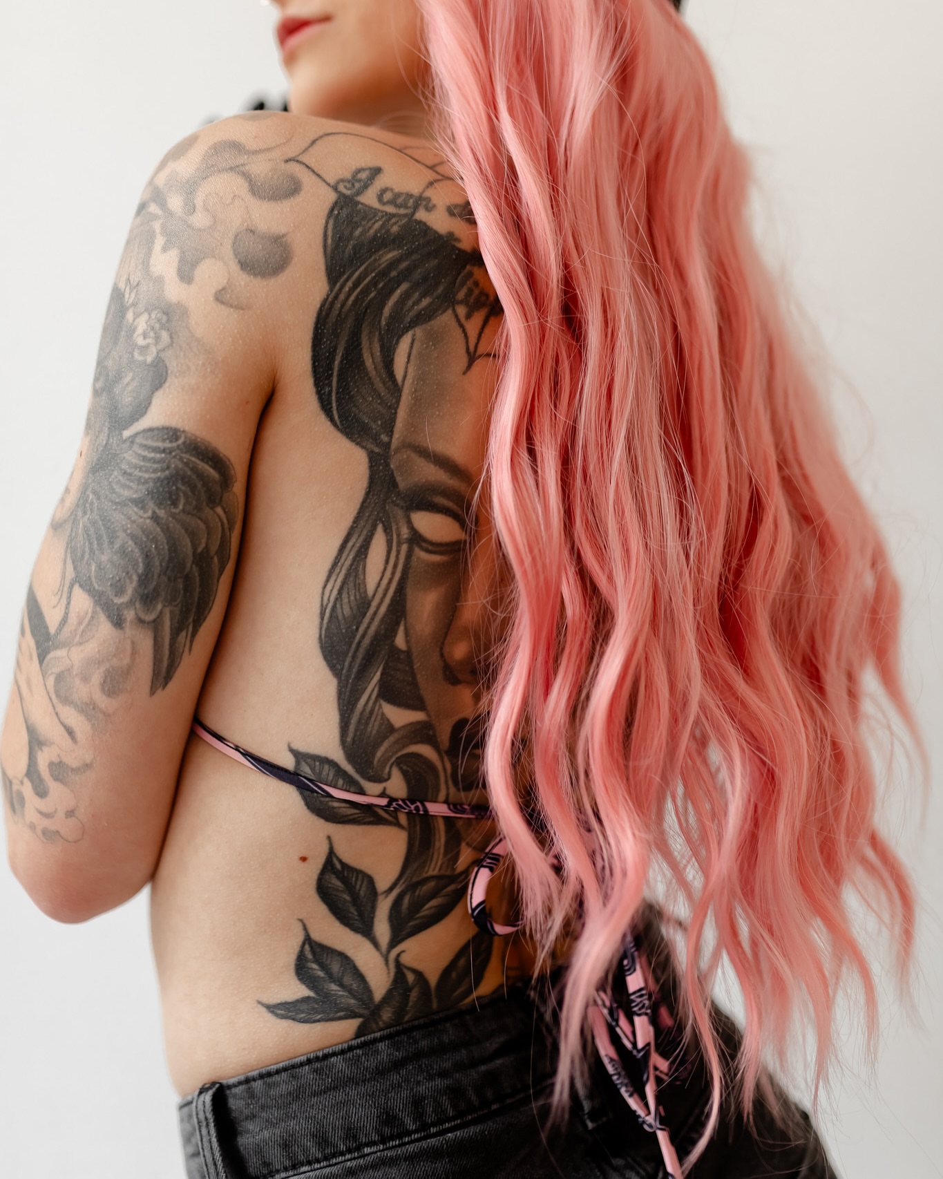 Woman American traditional tattoo on the back by Jordyn Tinney