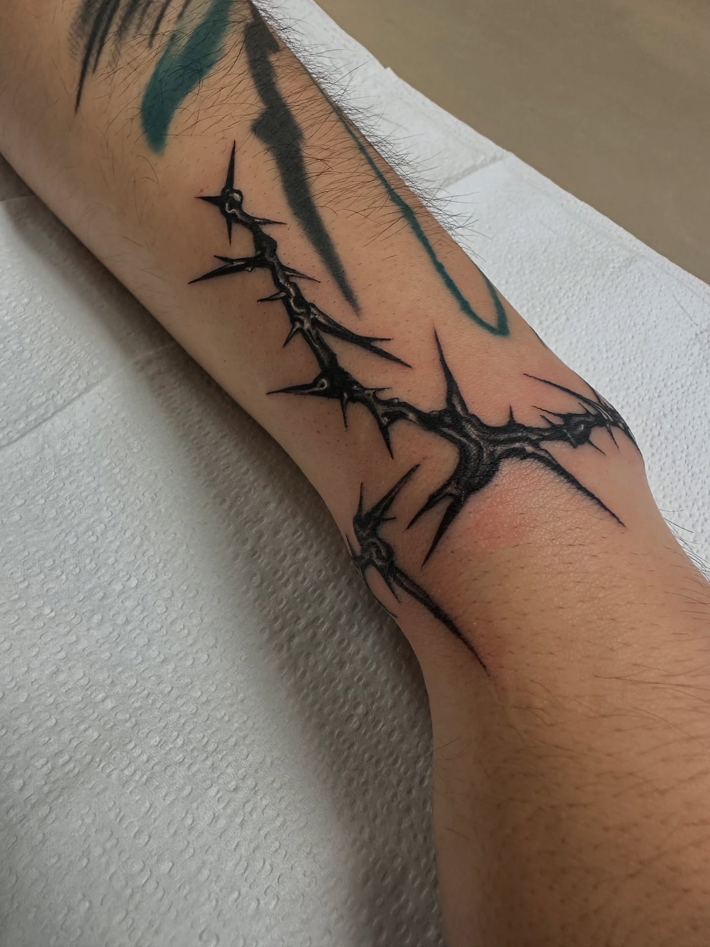 Thorns black and grey tattoo on the forearm by Juan Vega (tony)