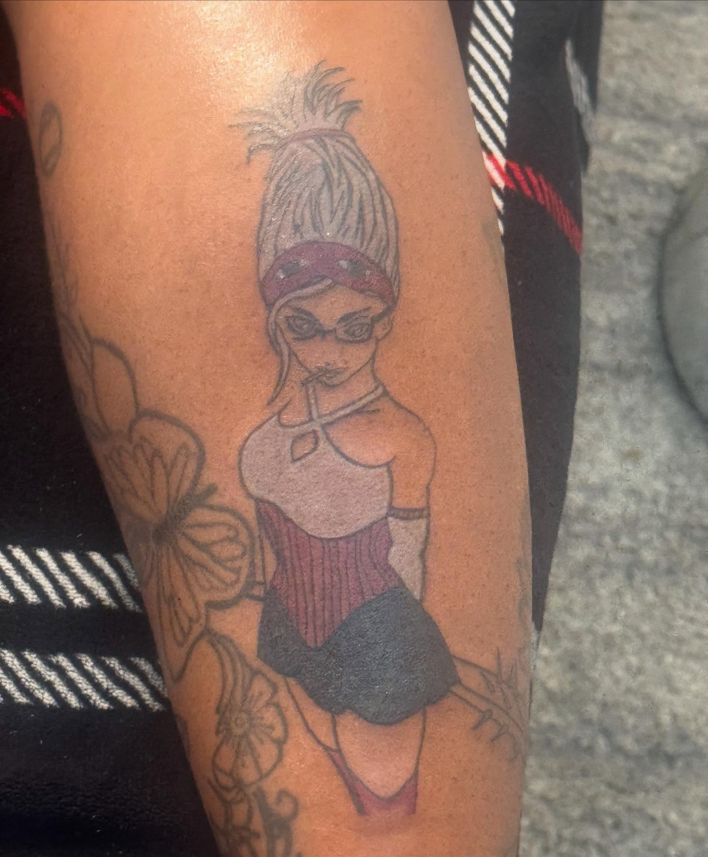 Anime character anime tattoo on the forearm by Family and Loyalty