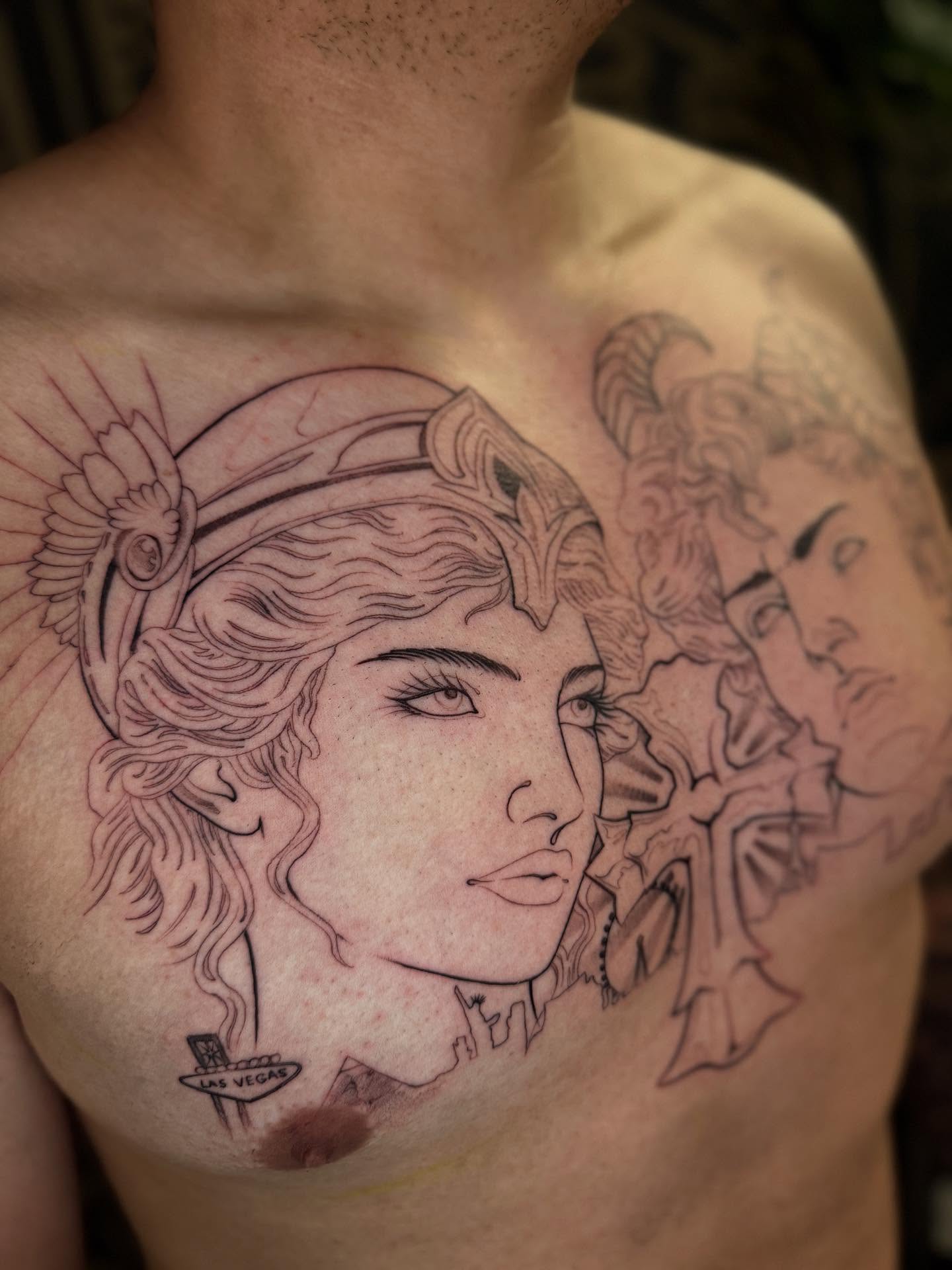 Woman with helmet realism tattoo on the chest by Angelo Buonanno, Las Vegas, Nevada