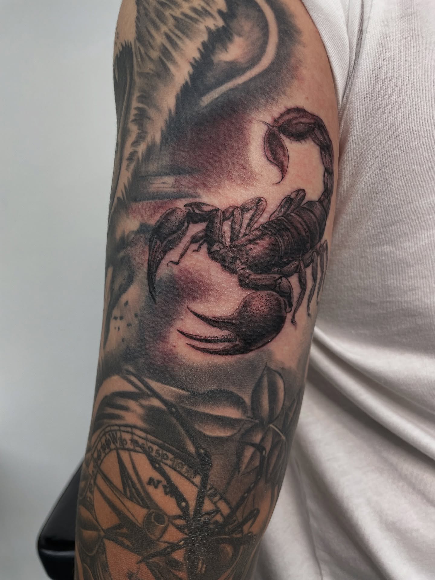 Scorpion black and grey tattoo on the forearm by Cultura