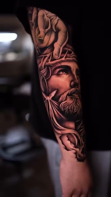 Jesus Christ portrait realism tattoo by Esto