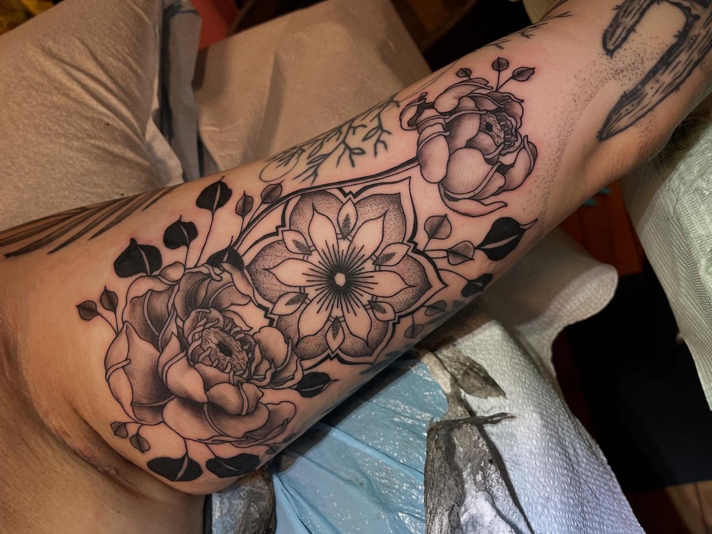Floral bouquet dotwork tattoo on the forearm by Lake Stephens, Richmond, Virginia