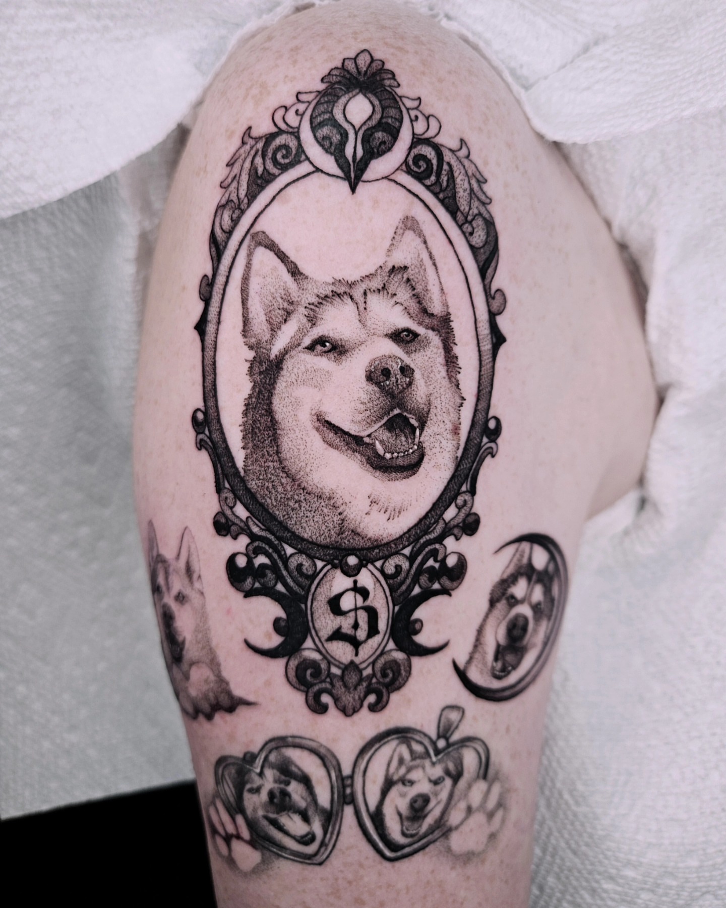 Dog portrait realism tattoo on the forearm by Sabrina Wagner