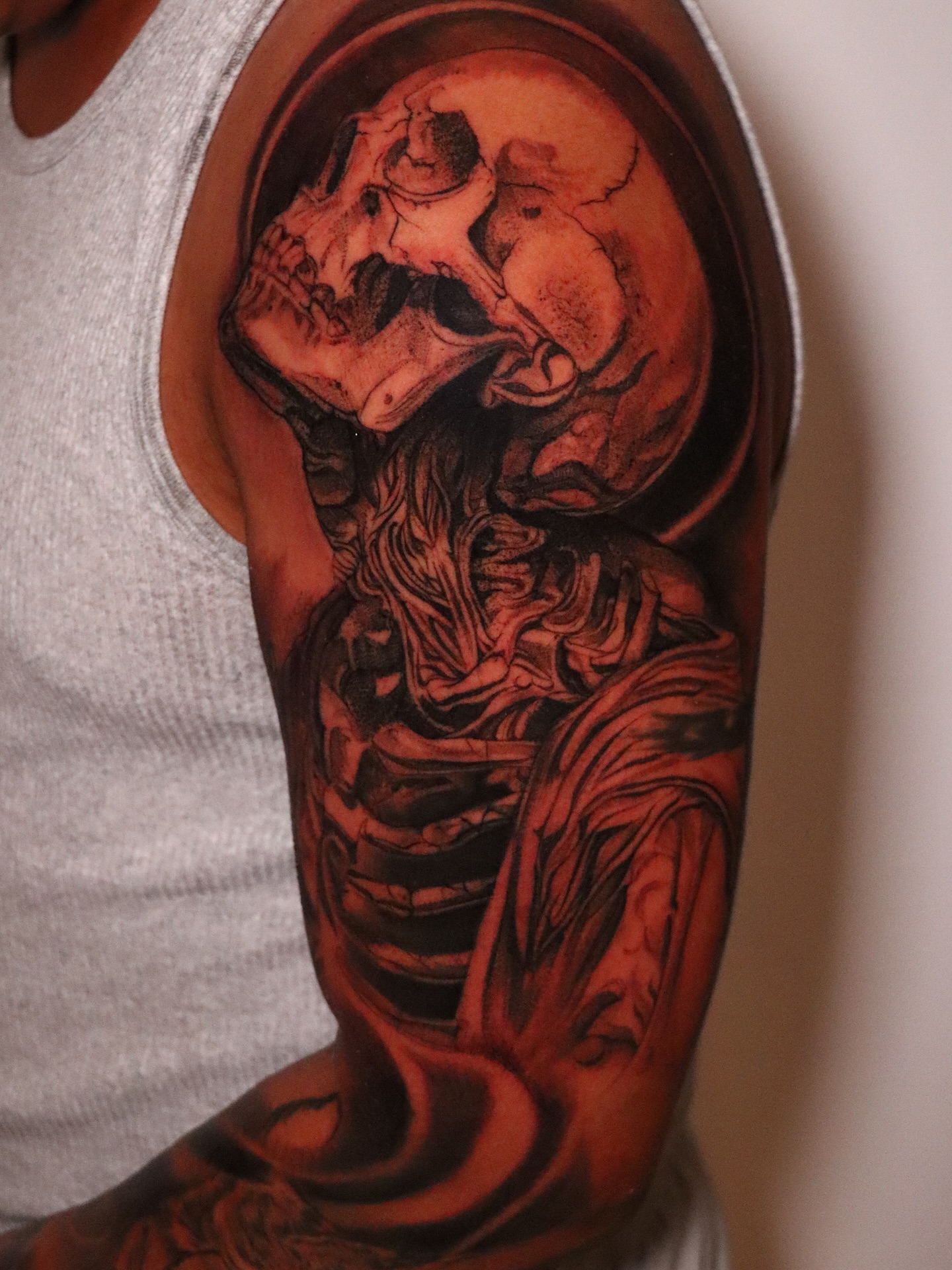 Skeleton dark realism tattoo on the forearm by elvis flores