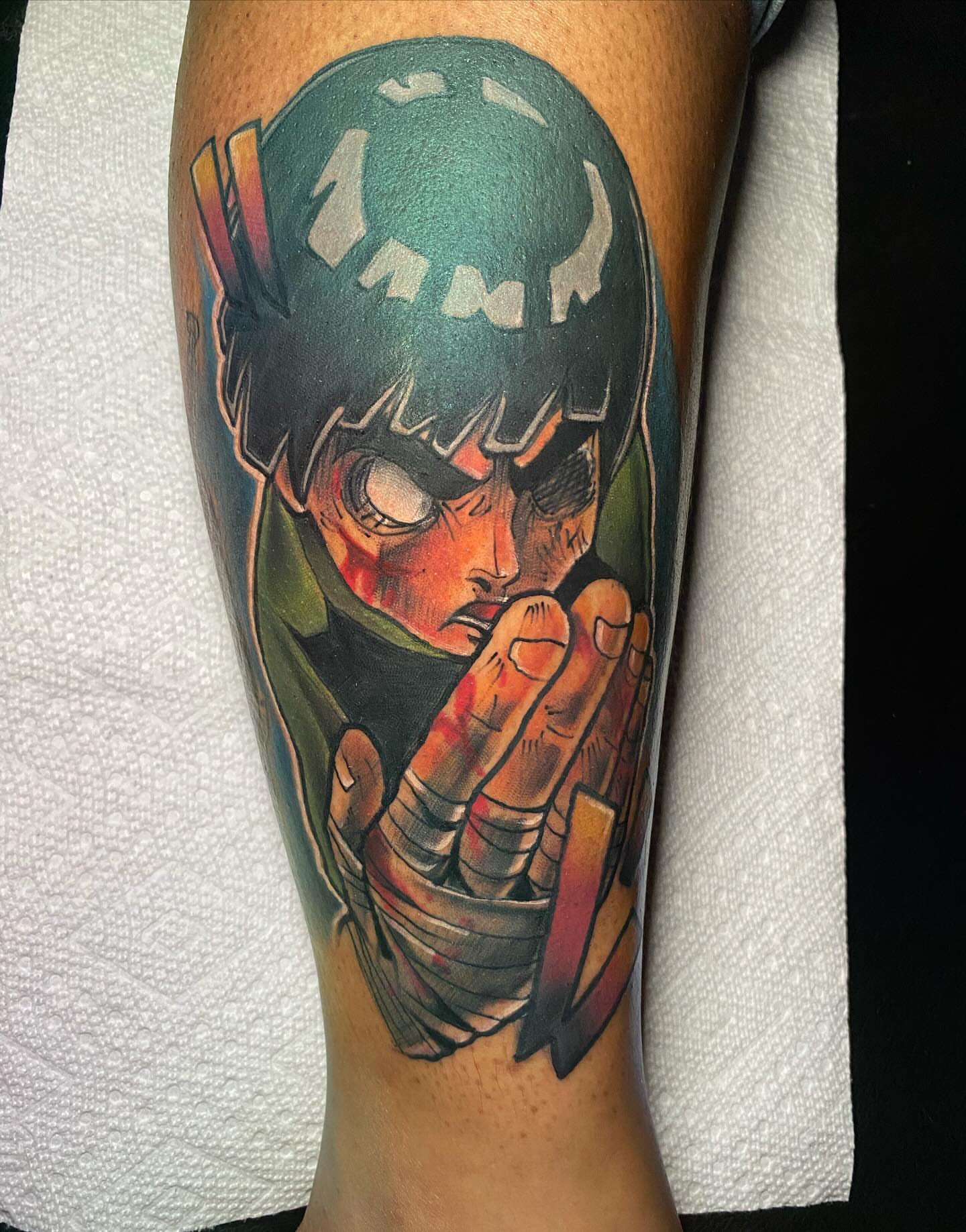Anime character anime tattoo on the forearm by Darius Armour (Tattoo Artist)