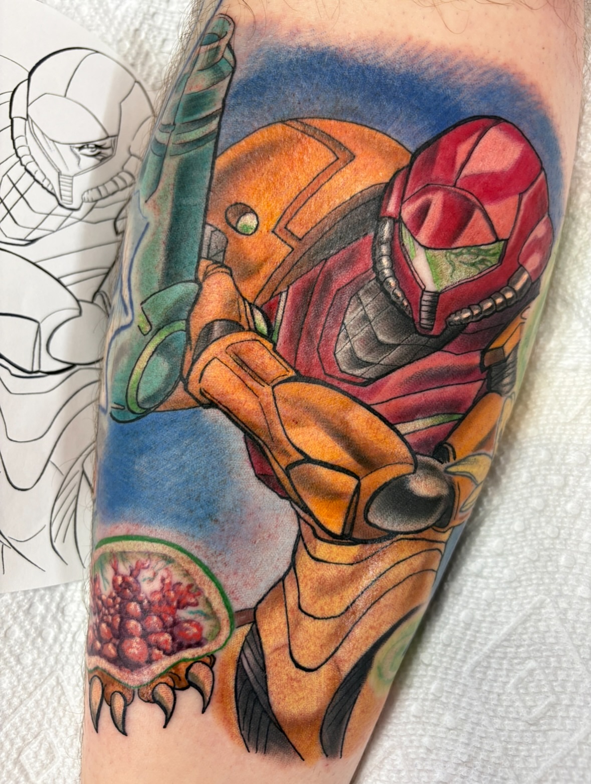 Metroid realism tattoo on the forearm by Gabby
