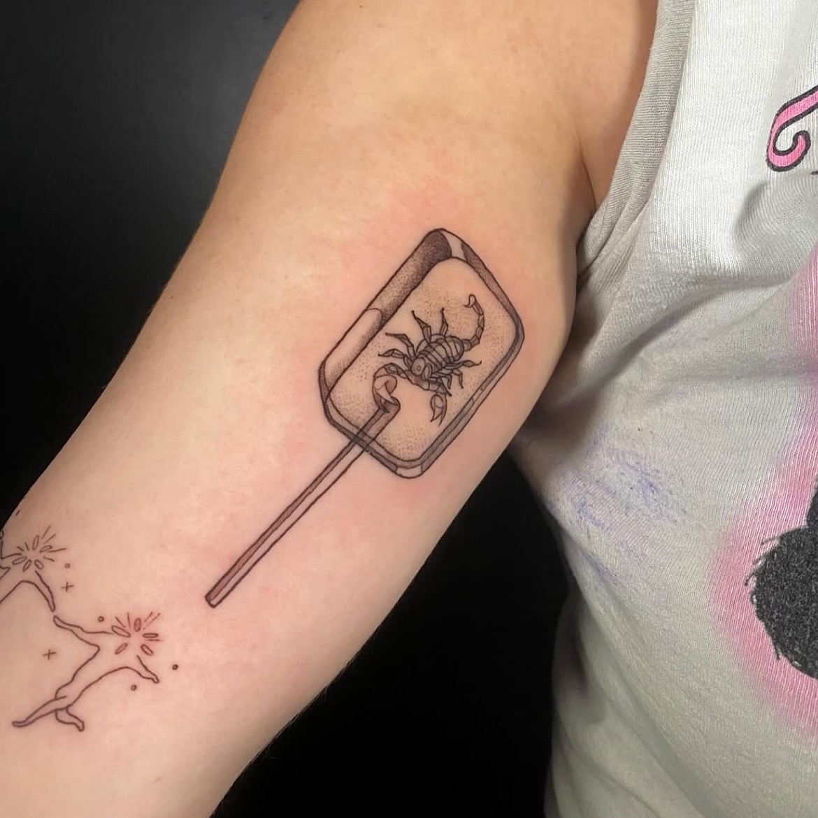 Scorpion lollipop dotwork tattoo on the forearm by Leah Hammes