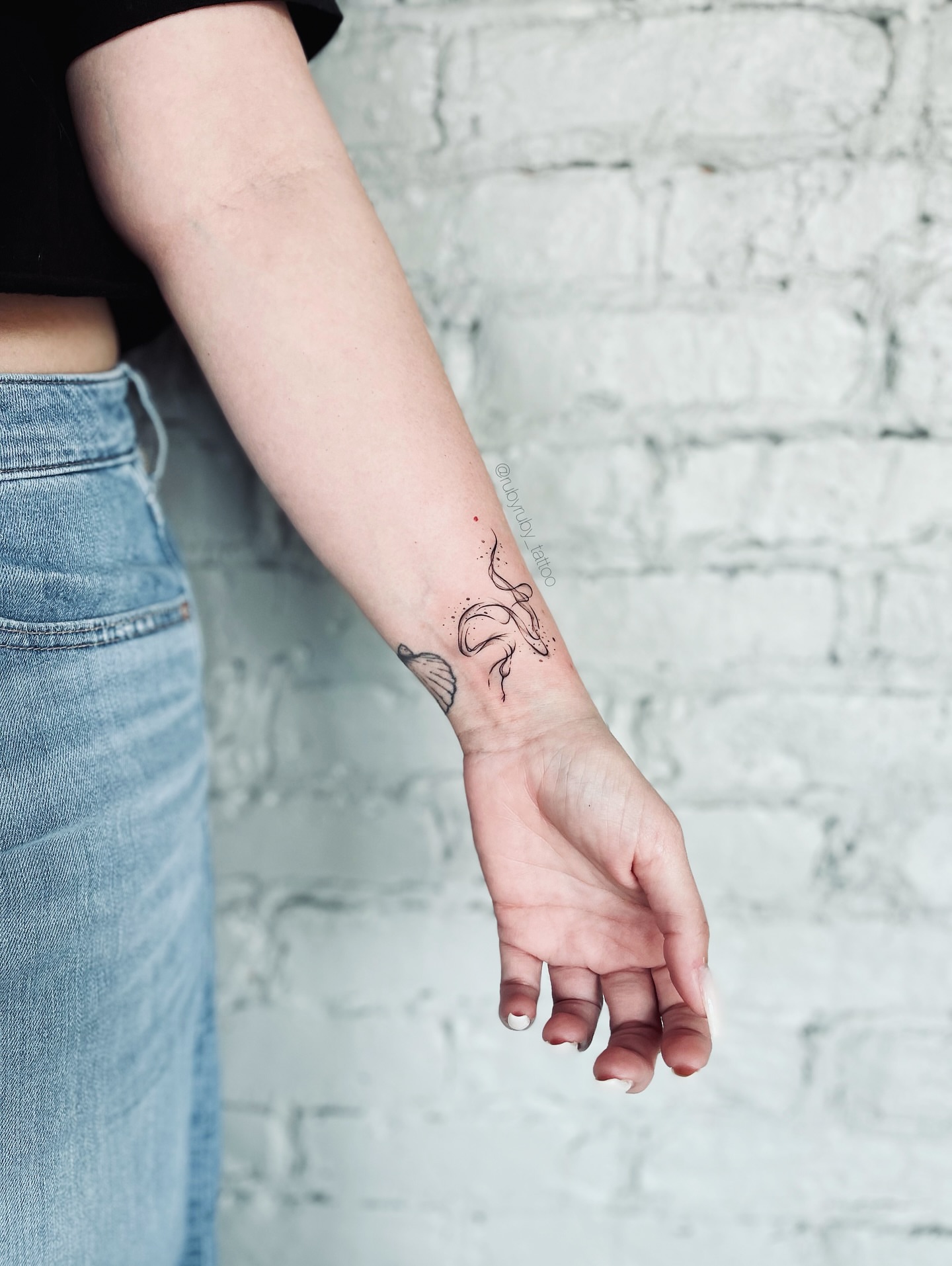 Abstract design dotwork tattoo on the forearm by Ruby ♥️