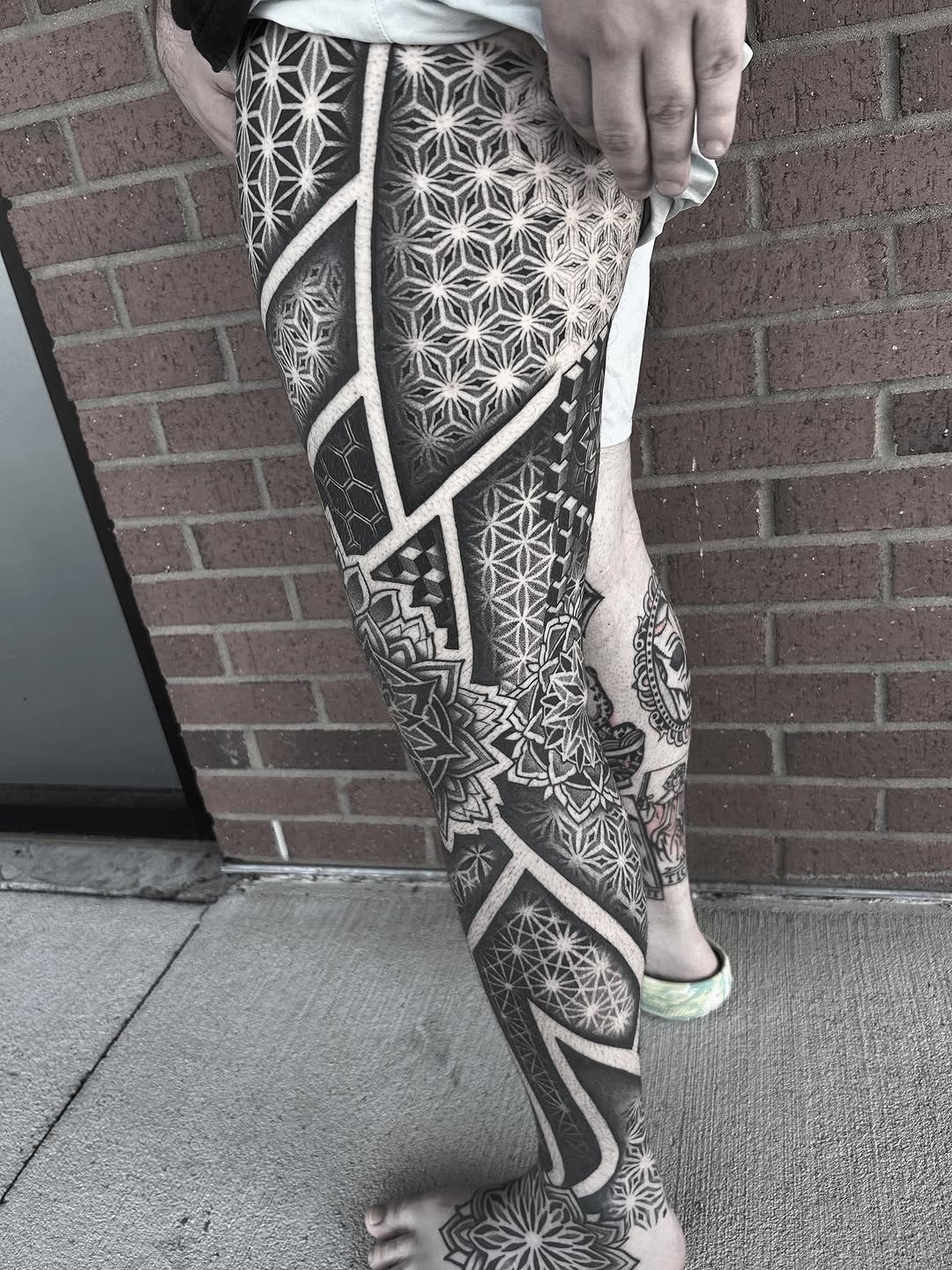 Geometric patterns geometric tattoo on the leg by Anna Nicole Thomas