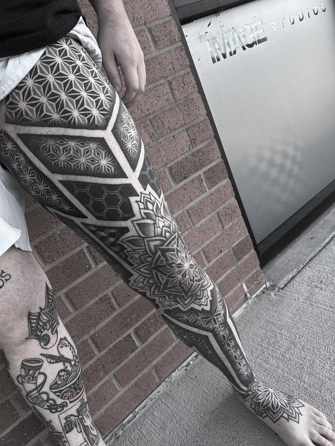 Geometric patterns and mandalas geometric tattoo on the leg by Anna Nicole Thomas