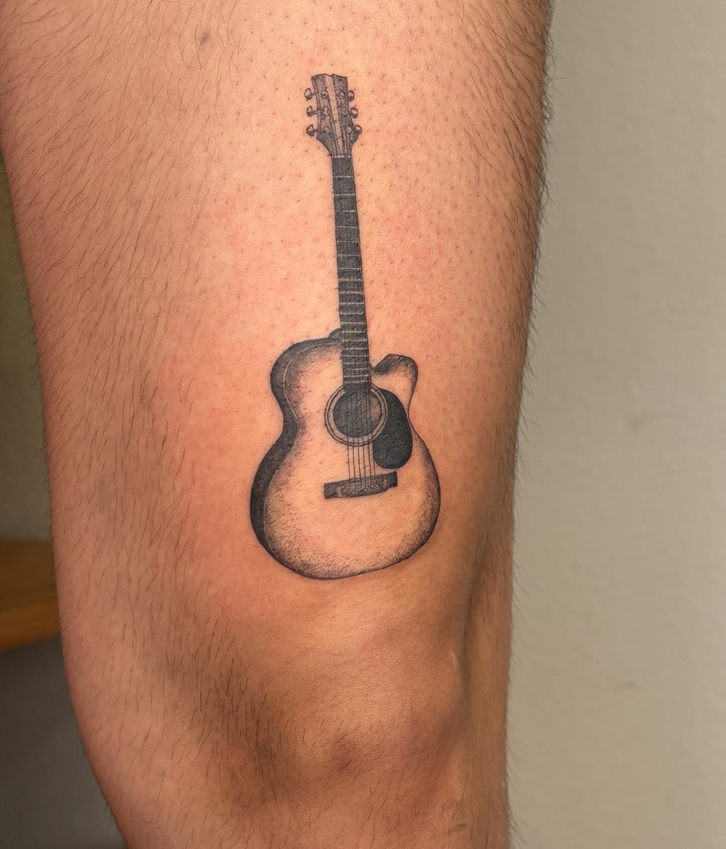 Acoustic guitar realism tattoo on the forearm by alyssa doing tattoos