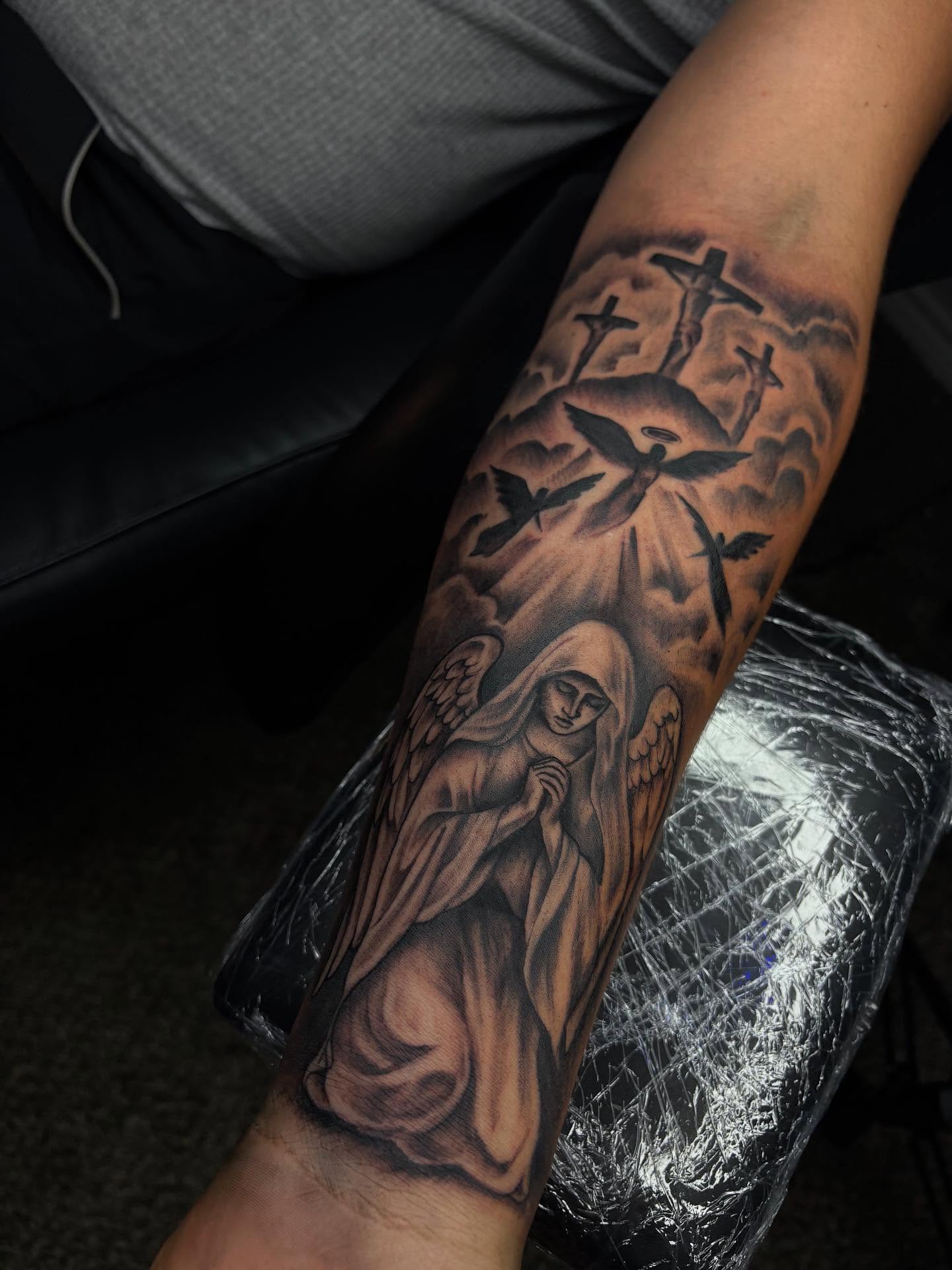 Angel with wings realism tattoo on the forearm by ✧ Dallas Tattoo Artist  ✧