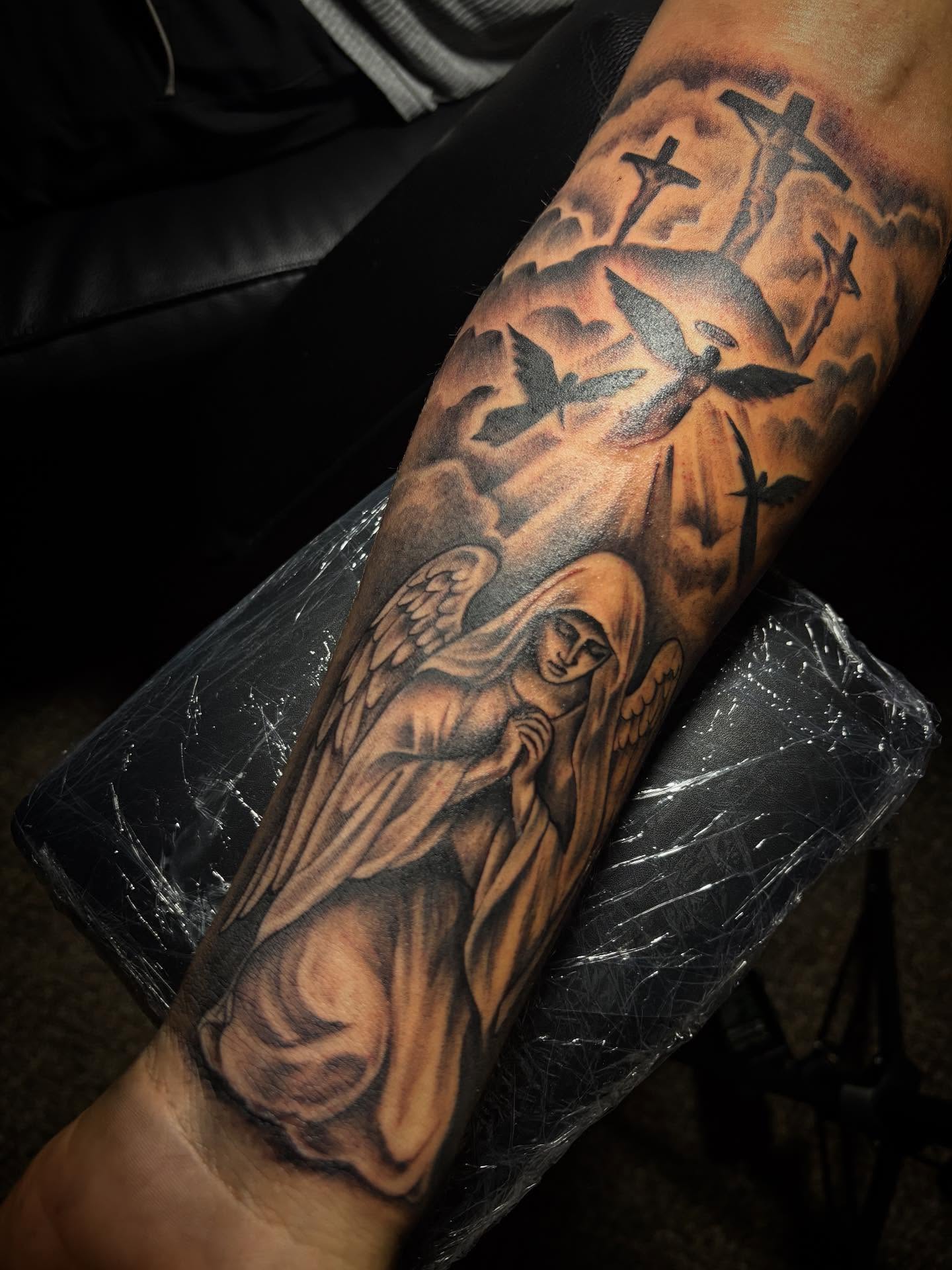 Angel with wings realism tattoo on the forearm by ✧ Dallas Tattoo Artist  ✧