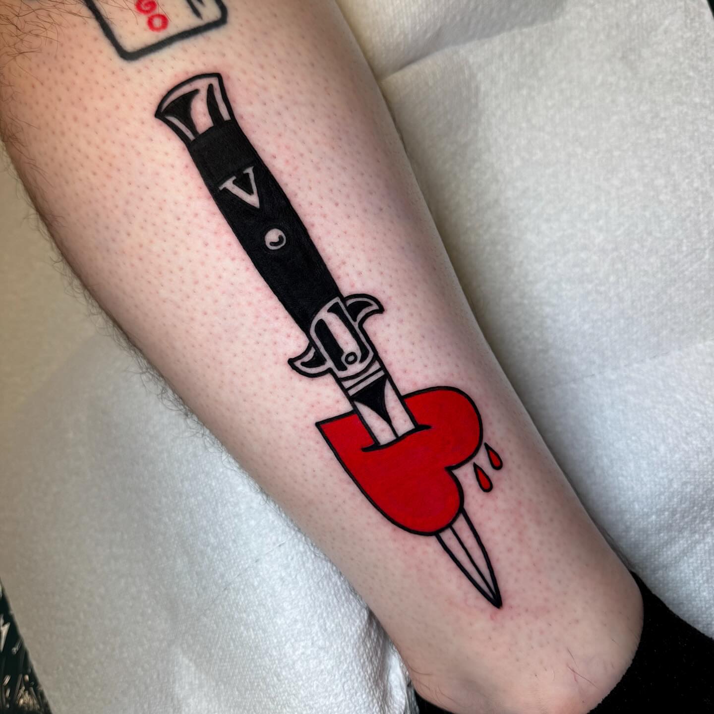 Knife through heart black and grey tattoo on the forearm by Alex Kass 🥩 San Antonio TX, San Antonio, Texas