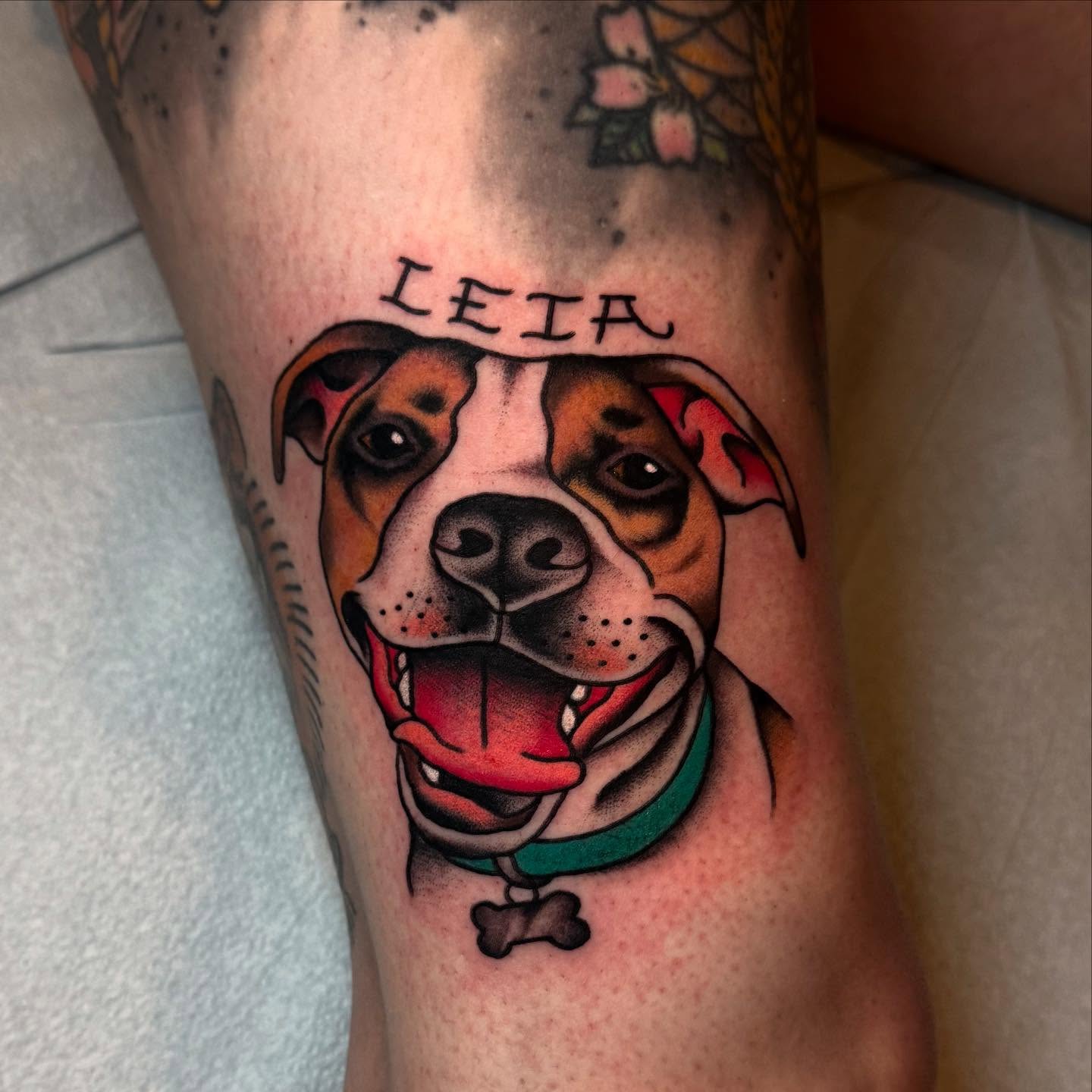 Dog realism tattoo on the forearm by Julia Louise