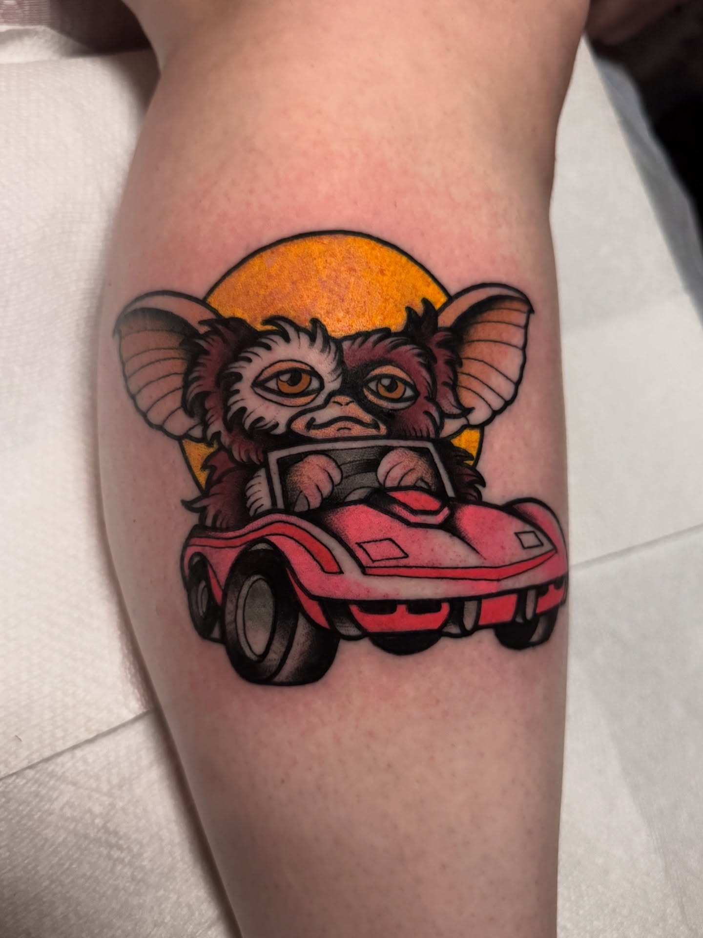Gremlin driving car dotwork tattoo on the thigh by K y l e   M a c K e n z i e, Salem, Massachusetts