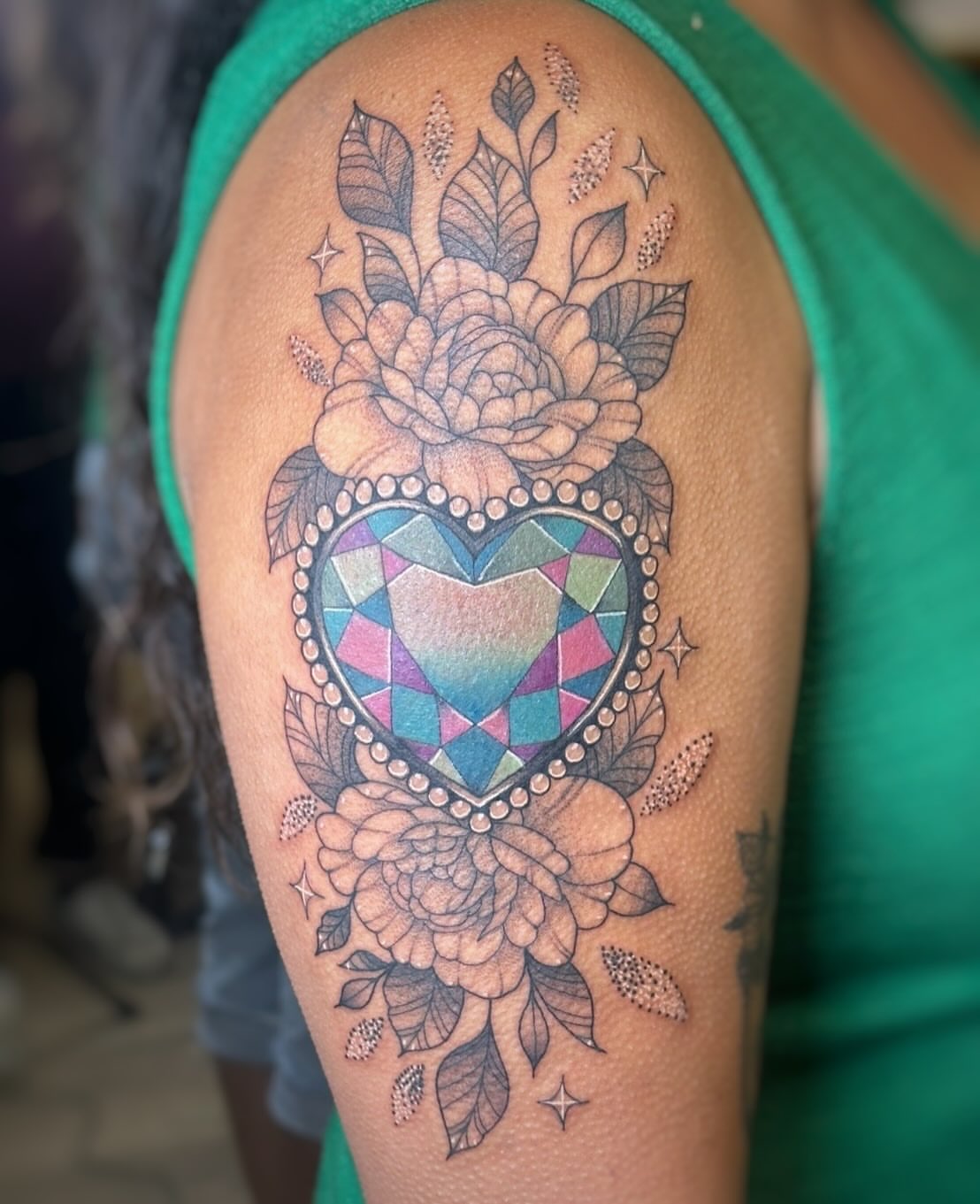 Heart with floral arrangement geometric tattoo on the shoulder by ππΌ Joana Diane Tattoos πΌπ