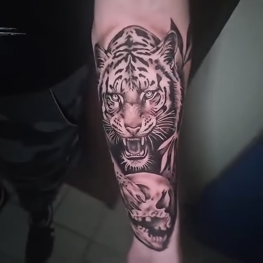 Tattoo by @jaz.ravenink — realism, black_and_grey