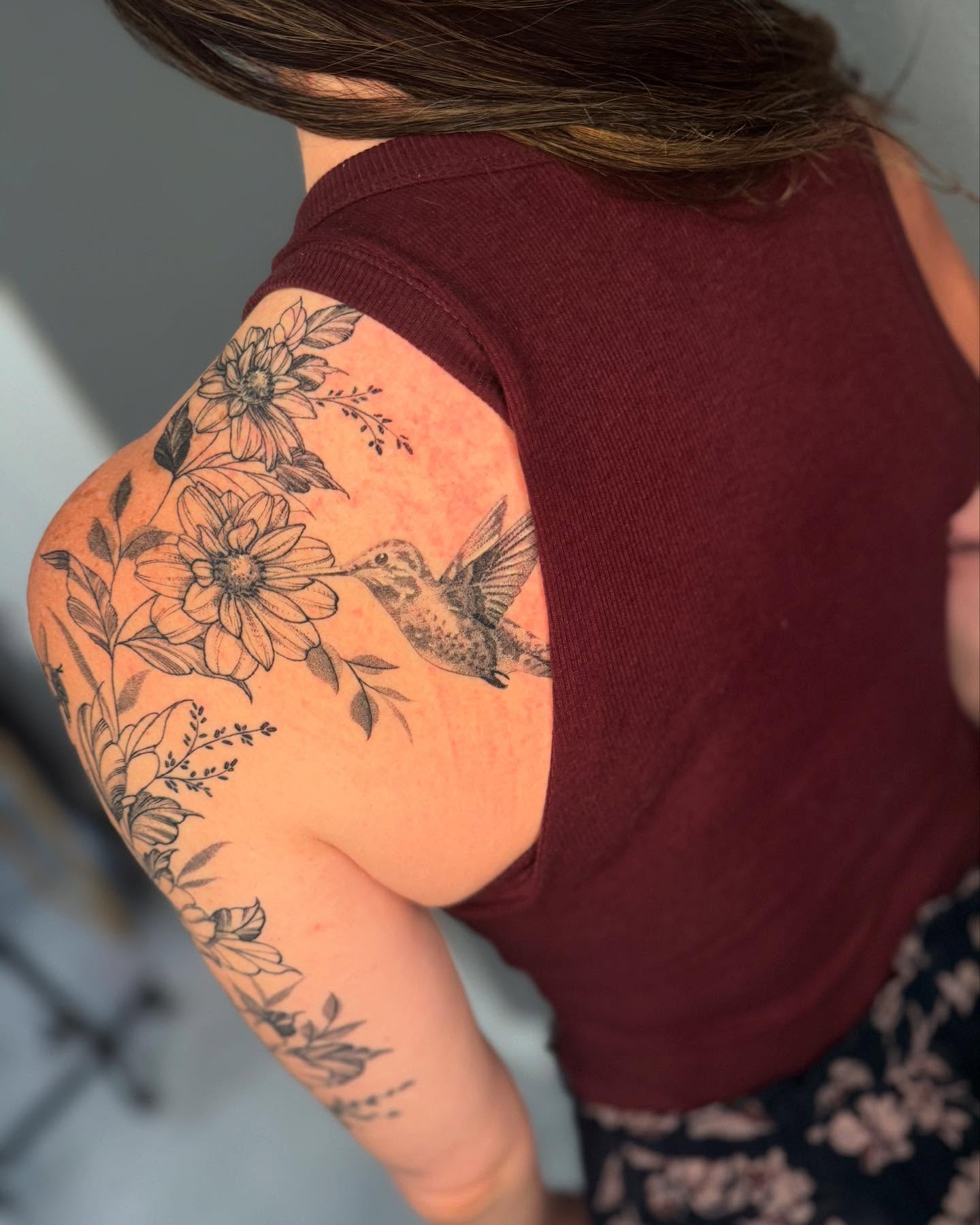 Hummingbird and flowers black and grey tattoo on the shoulder by Amber Starr, Midvale, Utah