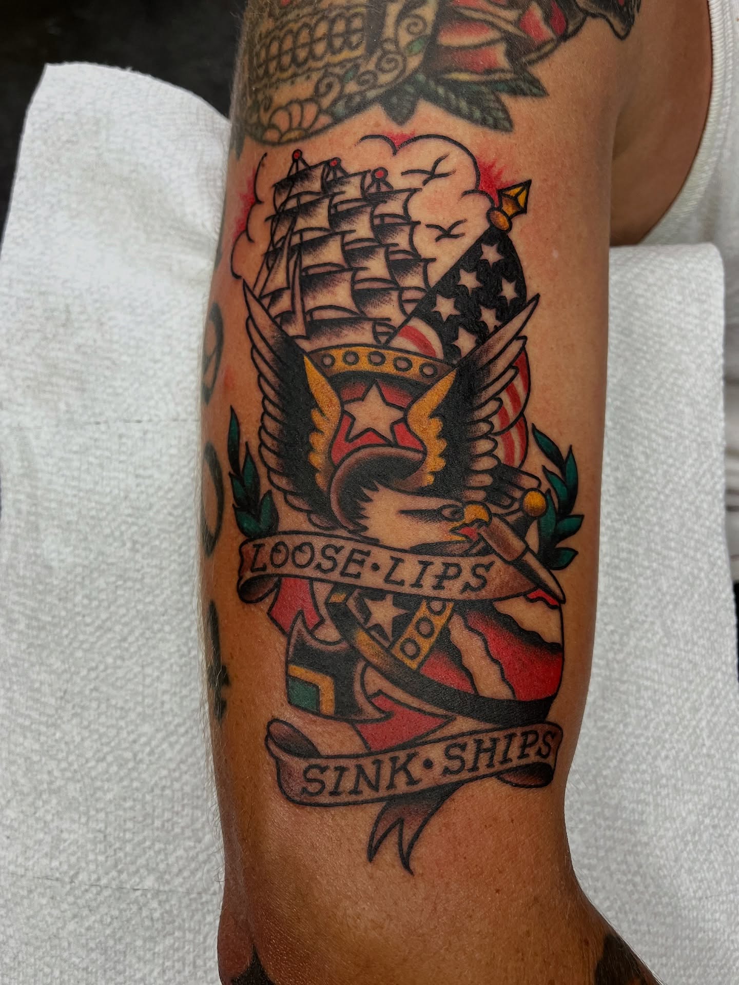 Loose lips sink ships American traditional tattoo on the forearm by Graham Niles