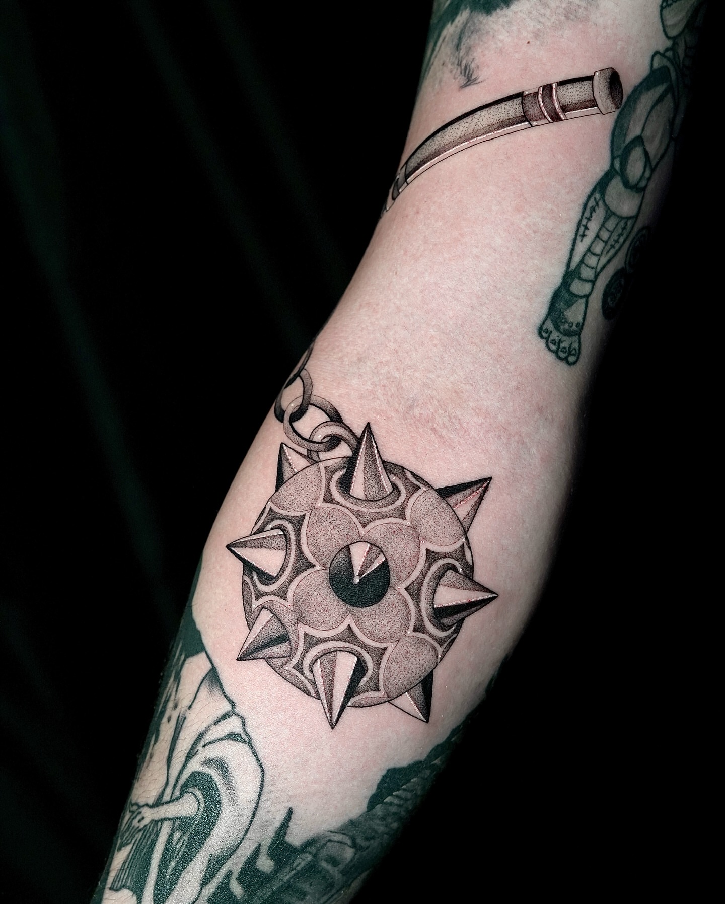 Geometric starburst geometric tattoo on the forearm by Fine line tattoo San Diego, San Diego, California