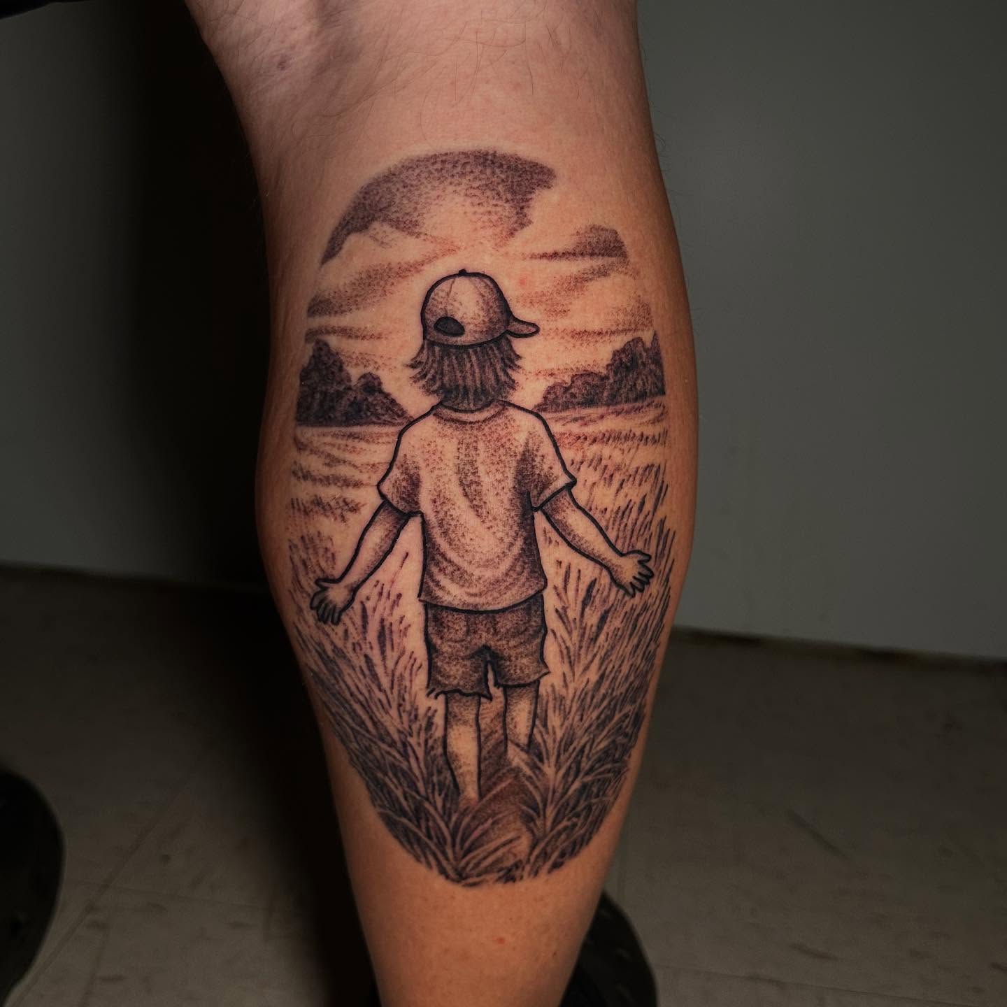 Child walking through field dotwork tattoo on the thigh by Josh Williams, Chattanooga, Tennessee