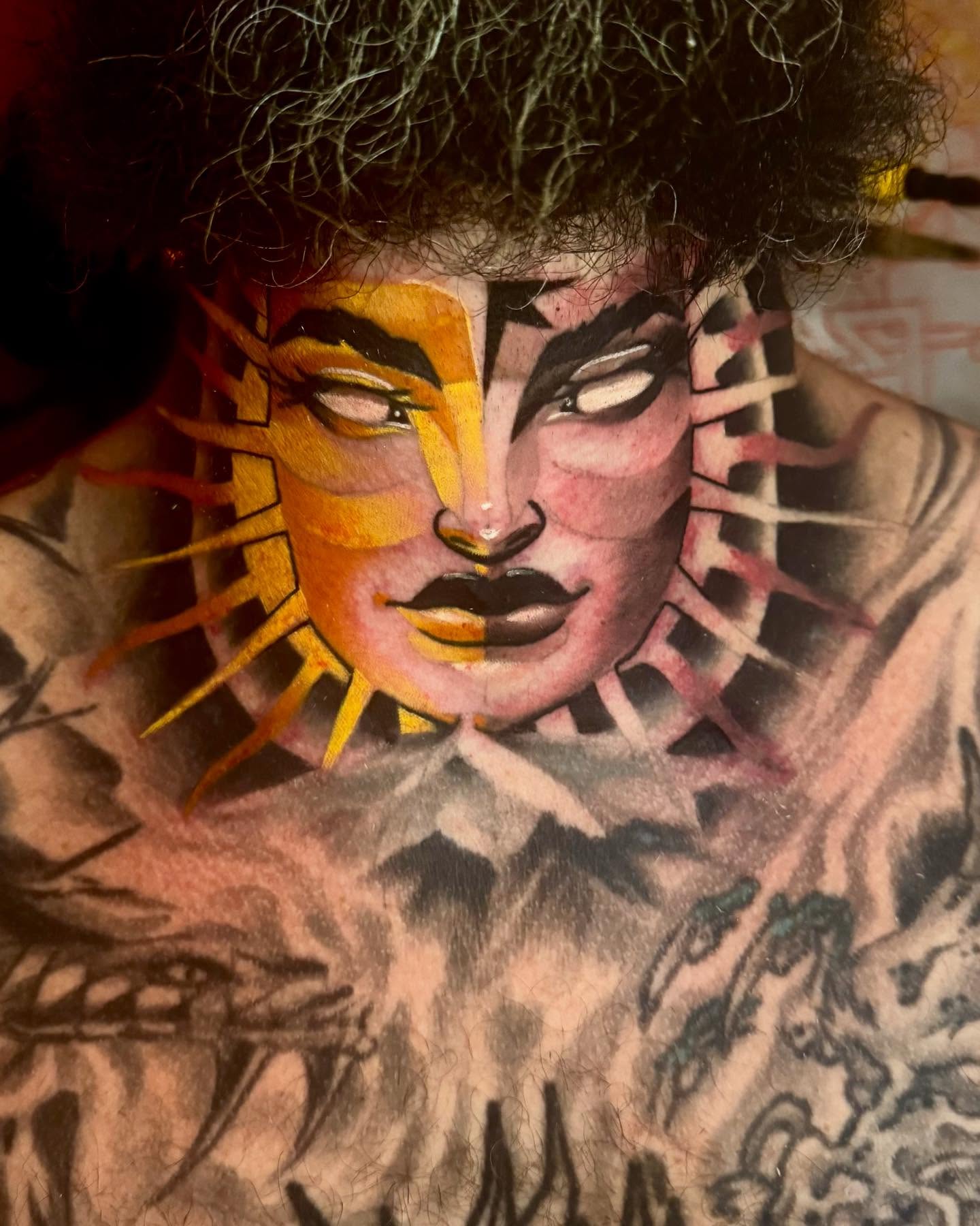 Solar deity American traditional tattoo on the torso by Sweets, Nashville, Tennessee