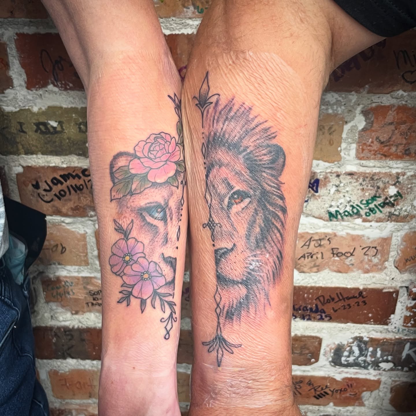Lion and floral American traditional tattoo on the forearm by Will McCoy (Tattooist), Murray, Utah