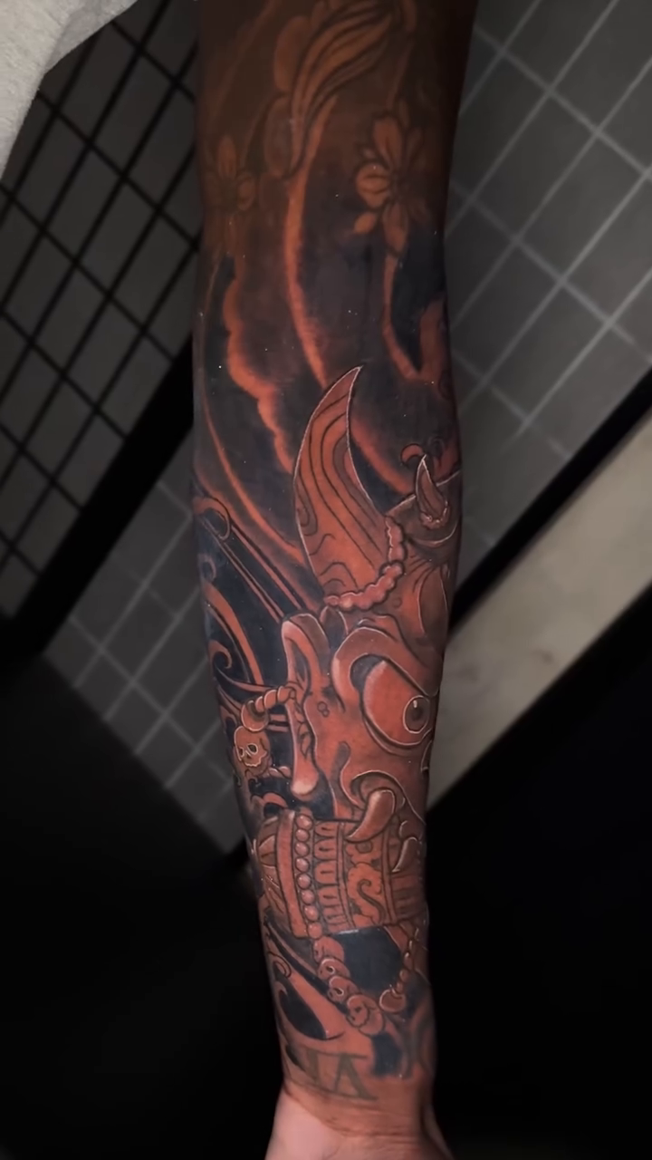 Oni mask and waves japanese irezumi tattoo by Sergio Ramirez