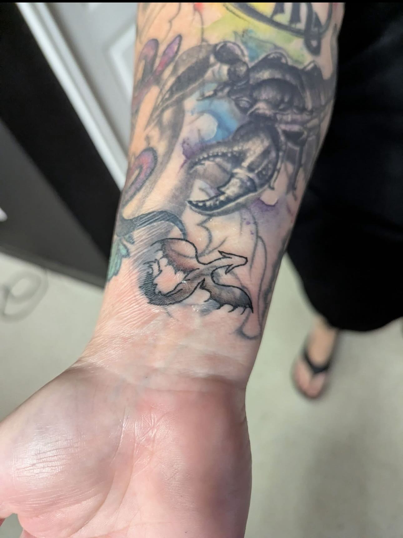 Scorpion and octopus watercolor tattoo on the forearm by Natalie Opal🪻🍎🫖