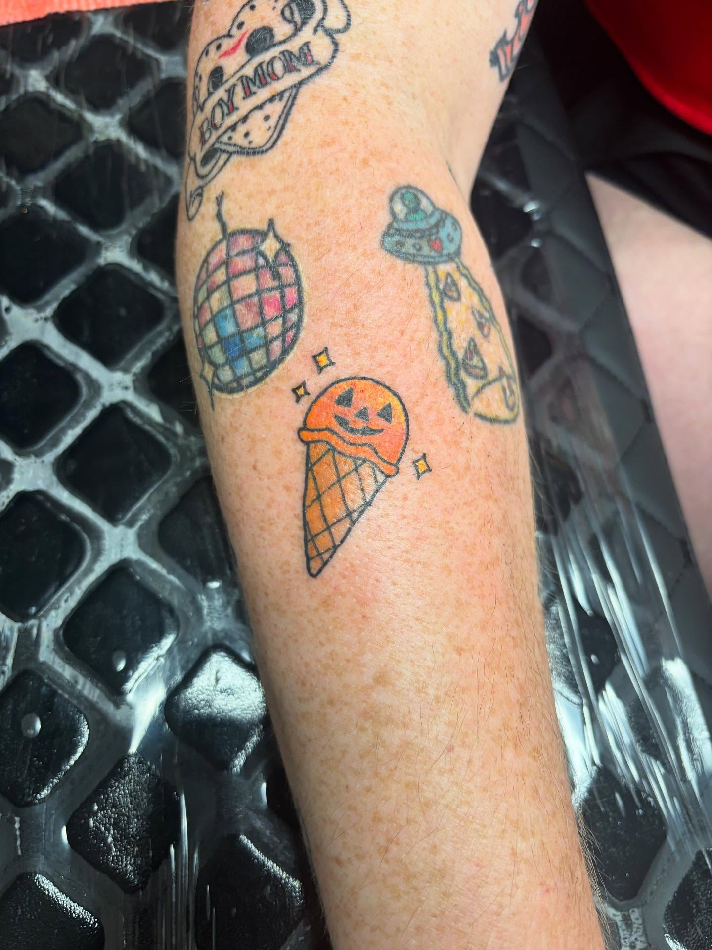 Ice cream cone American traditional tattoo on the forearm by Natalie Opal🪻🍎🫖