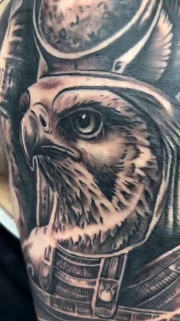 Egyptian falcon god realism tattoo by Steve Bishov