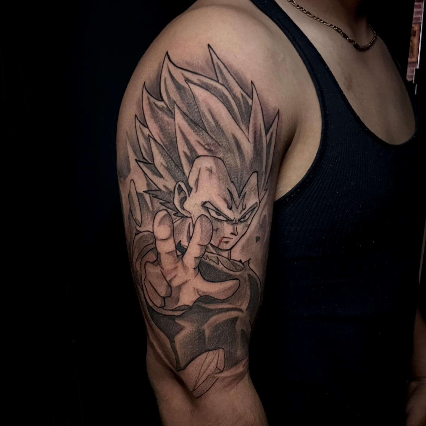 Vegeta anime tattoo on the upper arm by Tattoo Artist