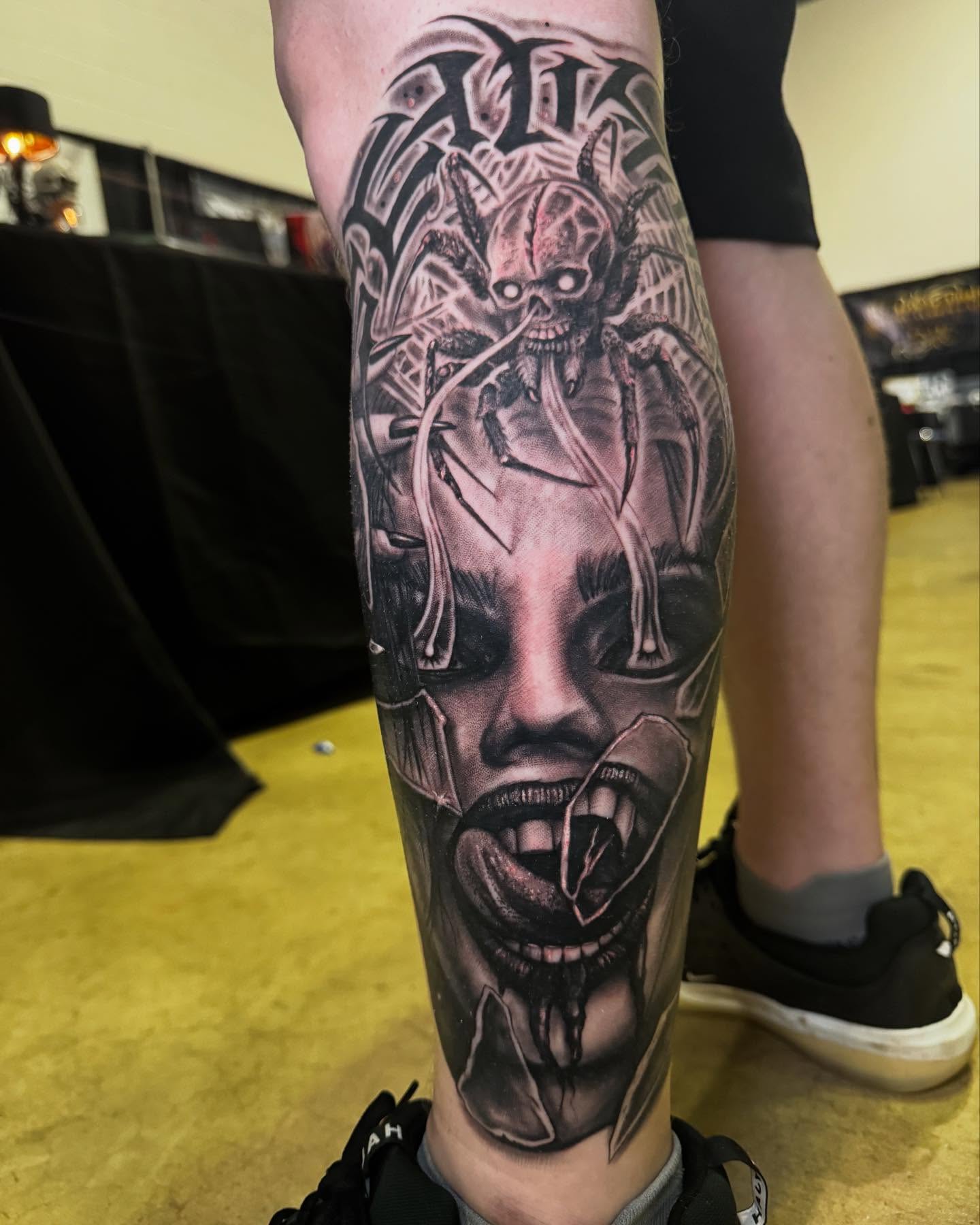 Demon dark realism tattoo on the forearm by Shawn Skale