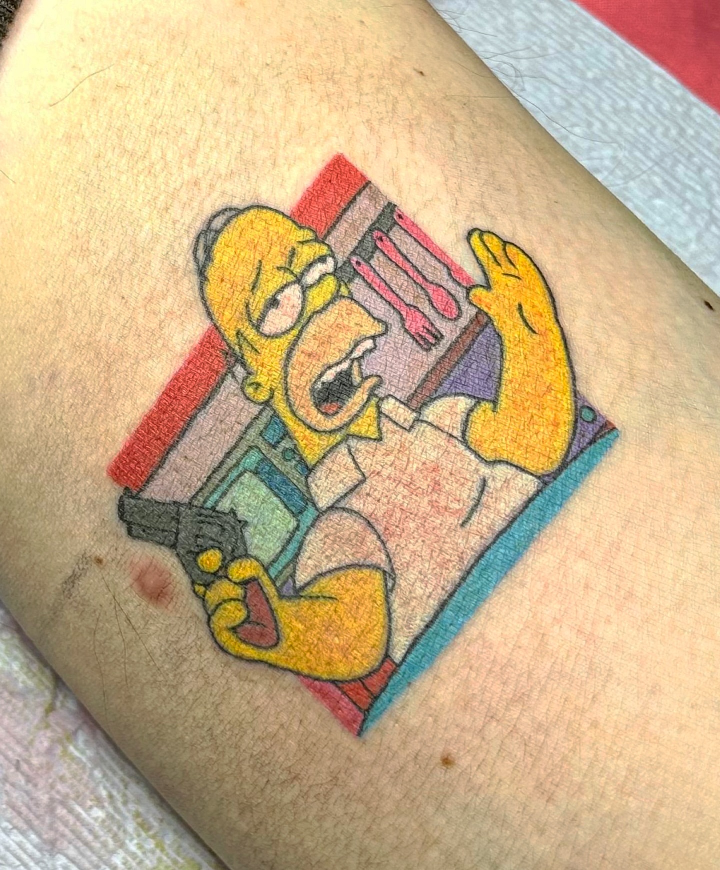 Homer simpson new school tattoo on the forearm by Mallory
