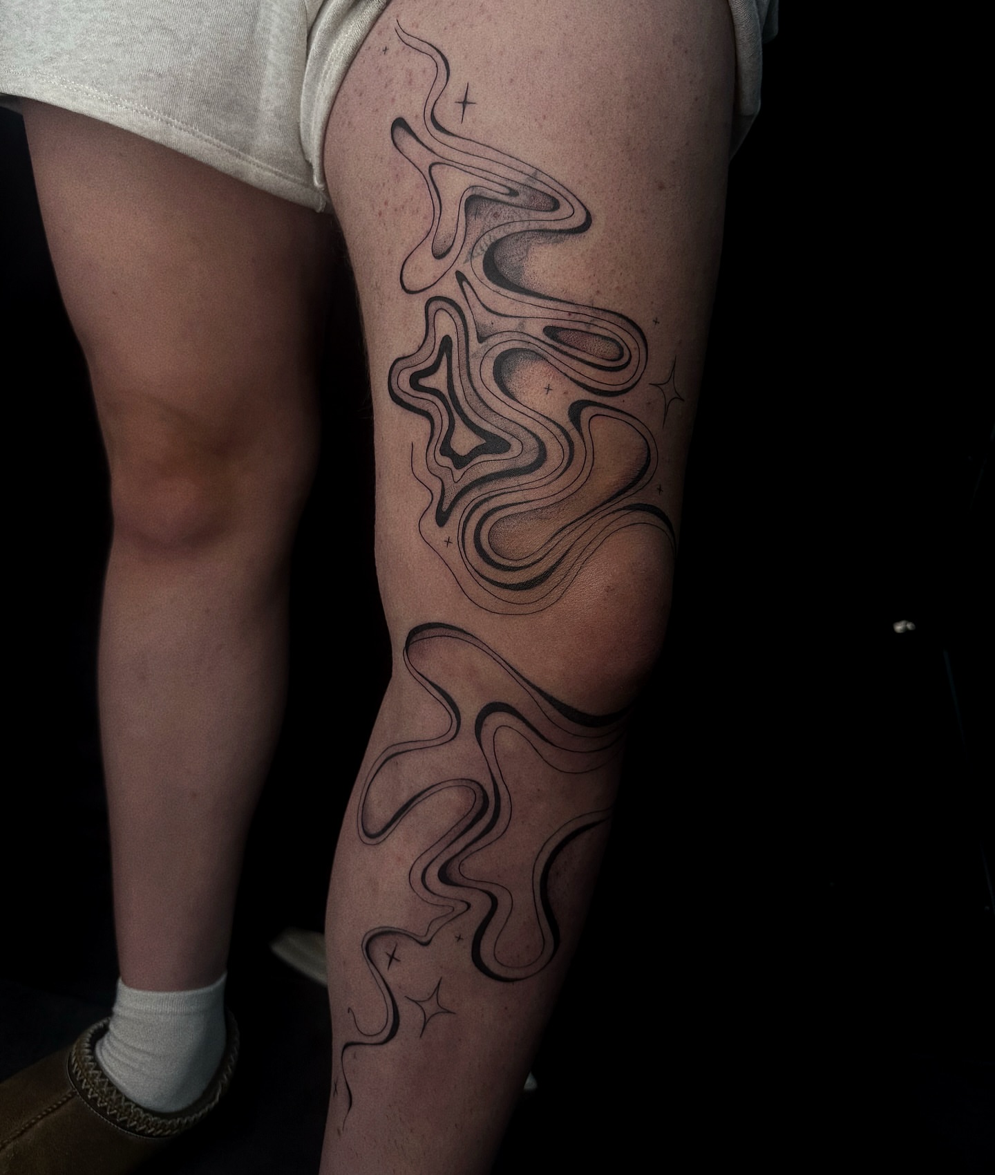 Abstract waves black and grey tattoo on the forearm by elena